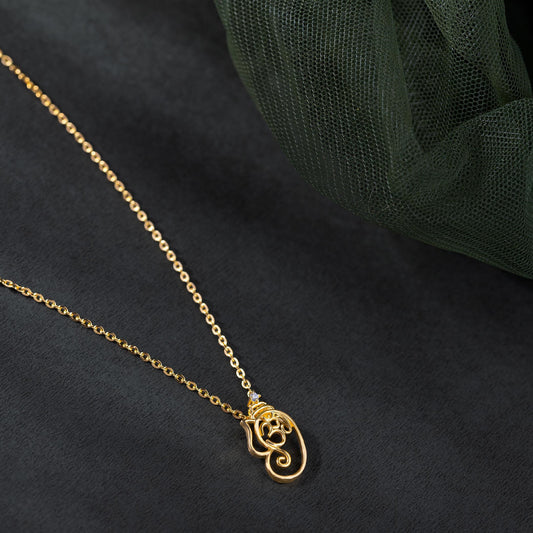 Golden Om Necklace with a Stone