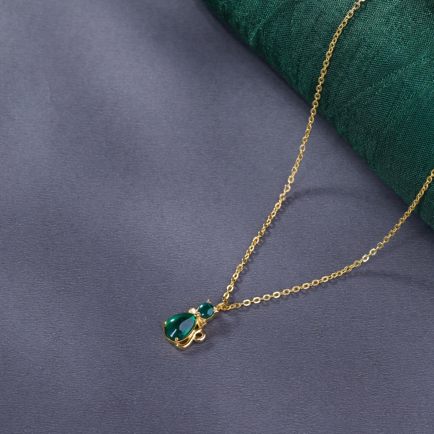 green cat pendant