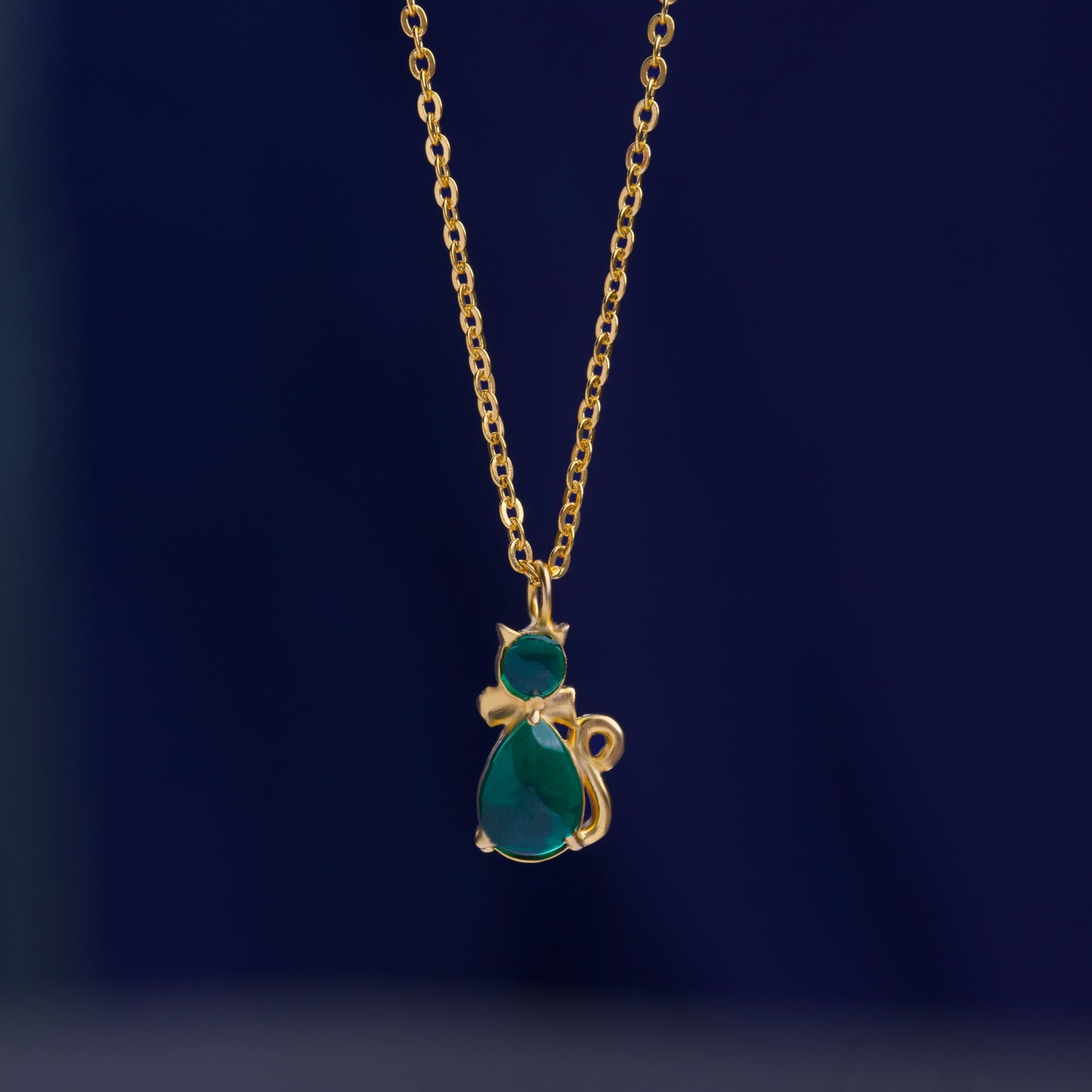 green cat pendant