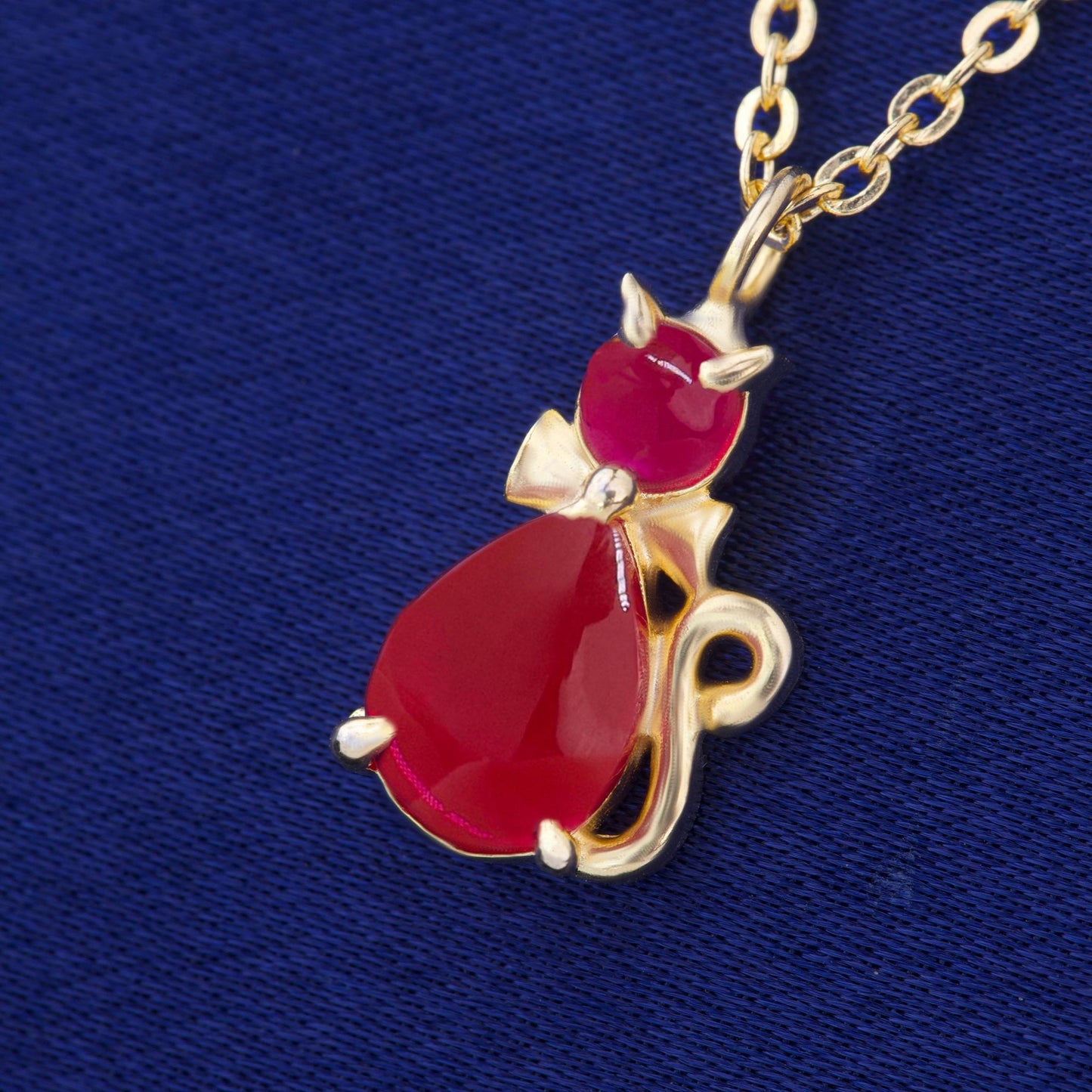 cat necklace with a golden chain