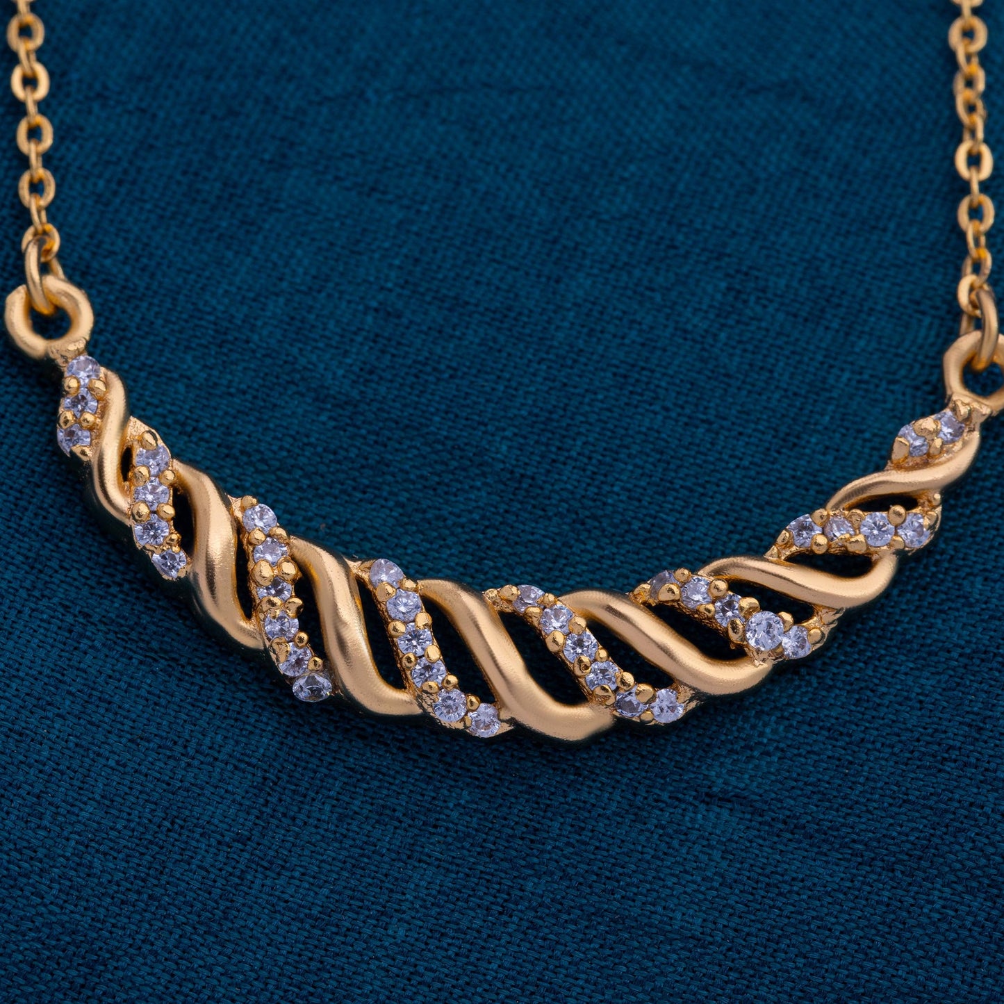 golden necklace with sapphire stones