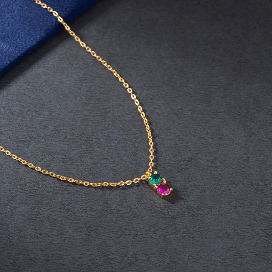 Golden Necklace with a Ruby and Emerald stones