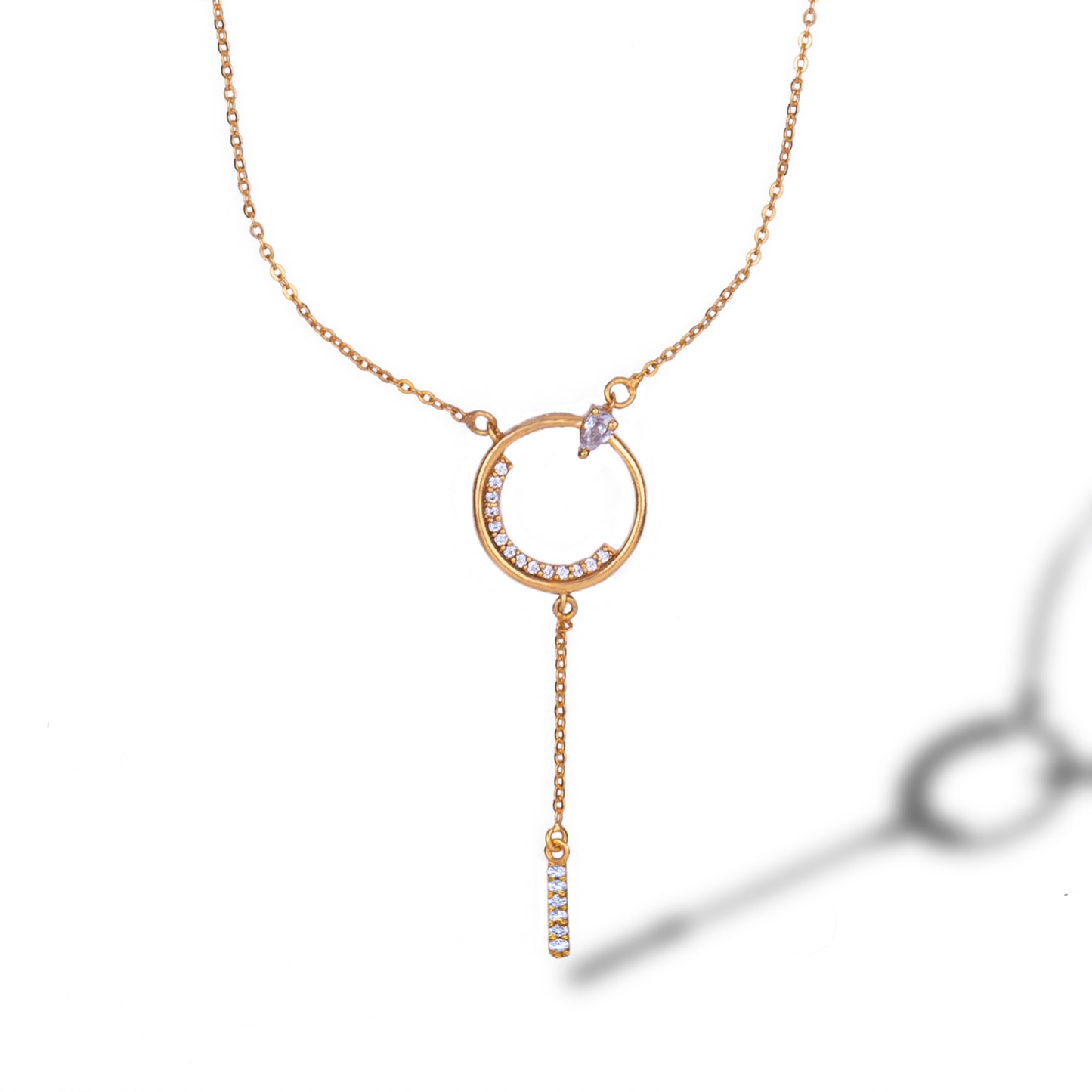 golden necklace with a diamond circle