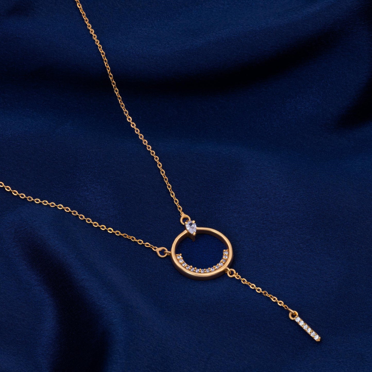 golden necklace with a diamond circle