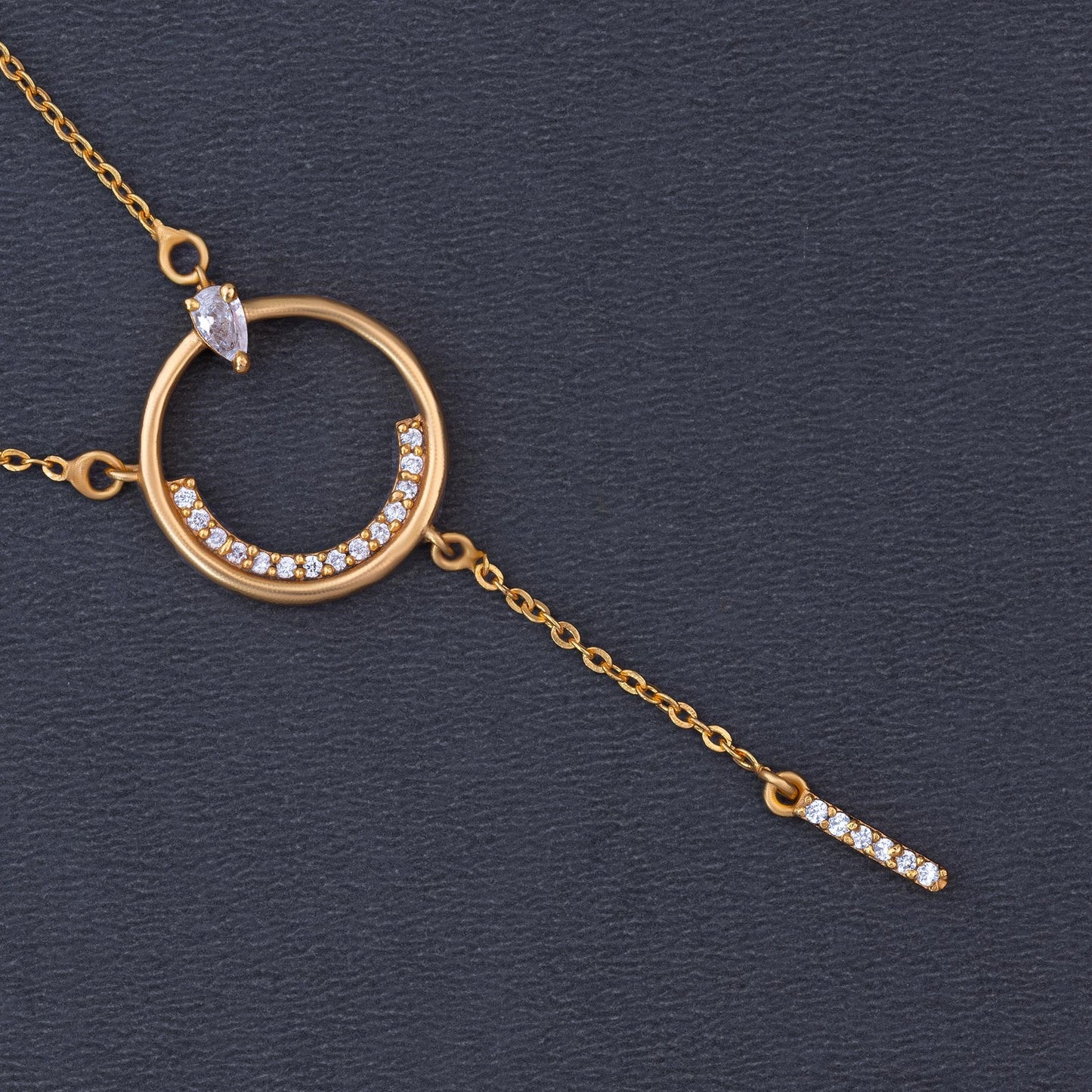 golden necklace with a diamond circle