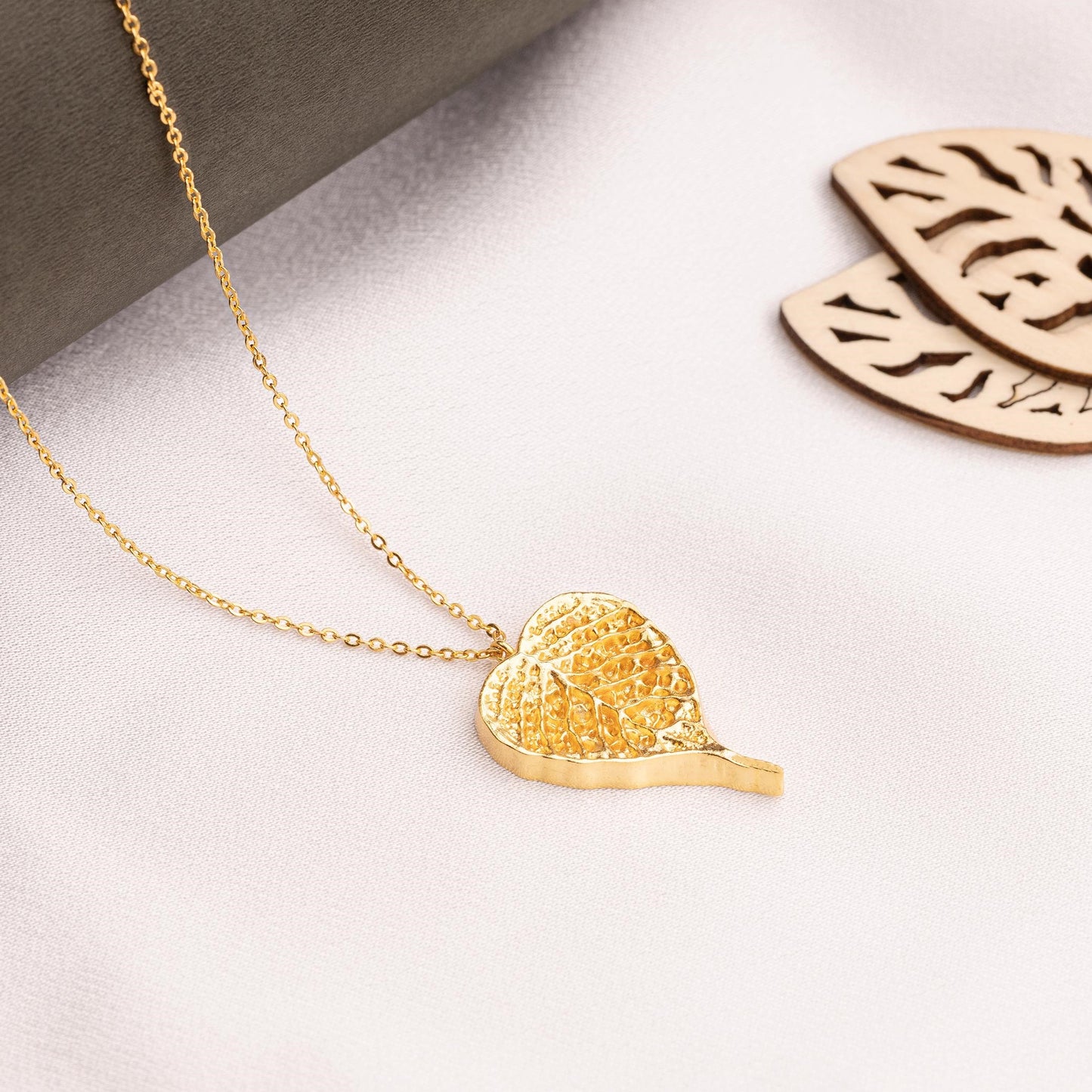 golden krishna leaf necklace with pendant