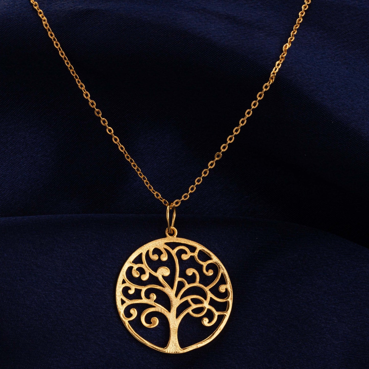 golden necklace with tree of life pendant