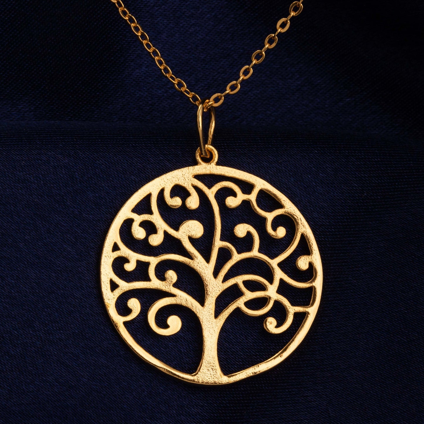 golden necklace with tree of life pendant