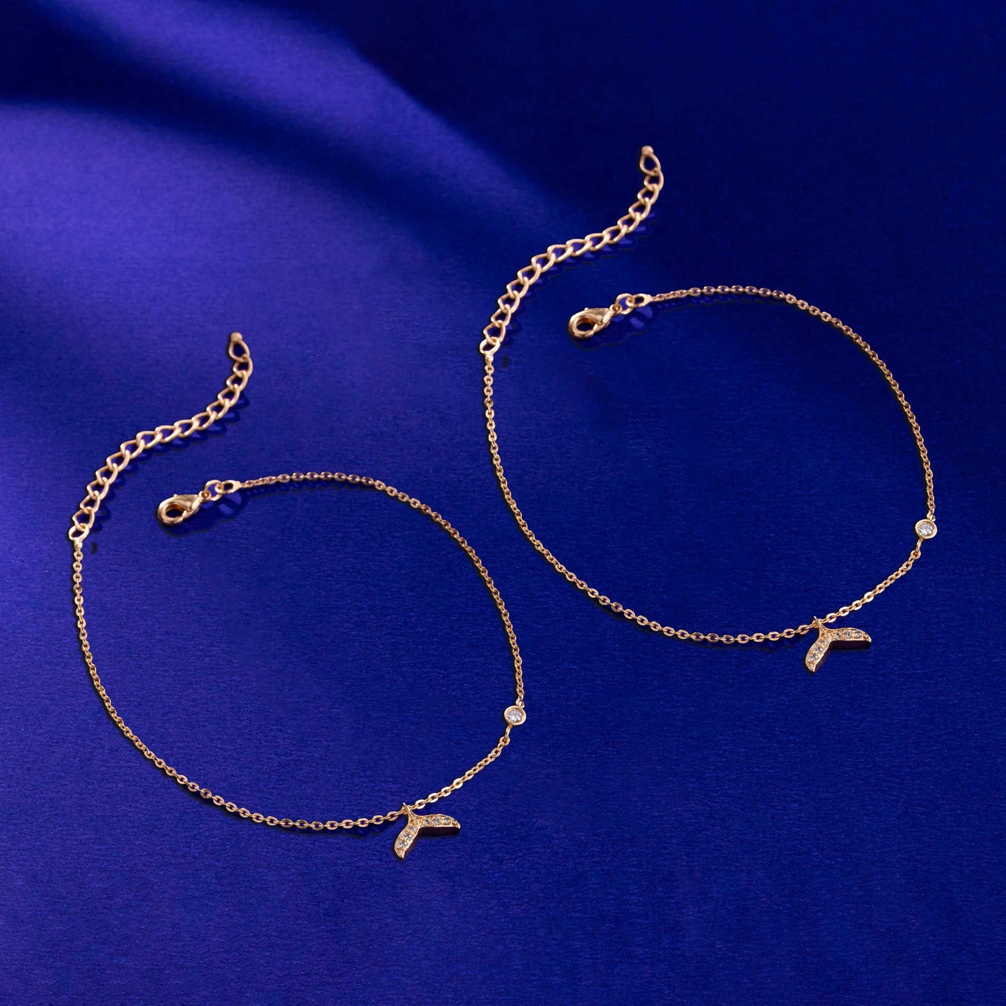 pair of golden anklets with stone