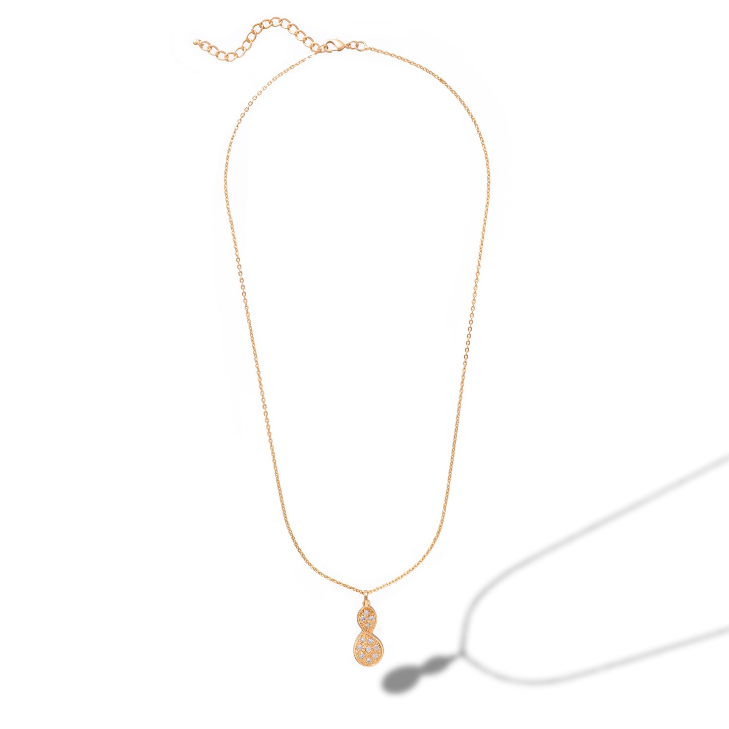 golden necklace with a diamond tear