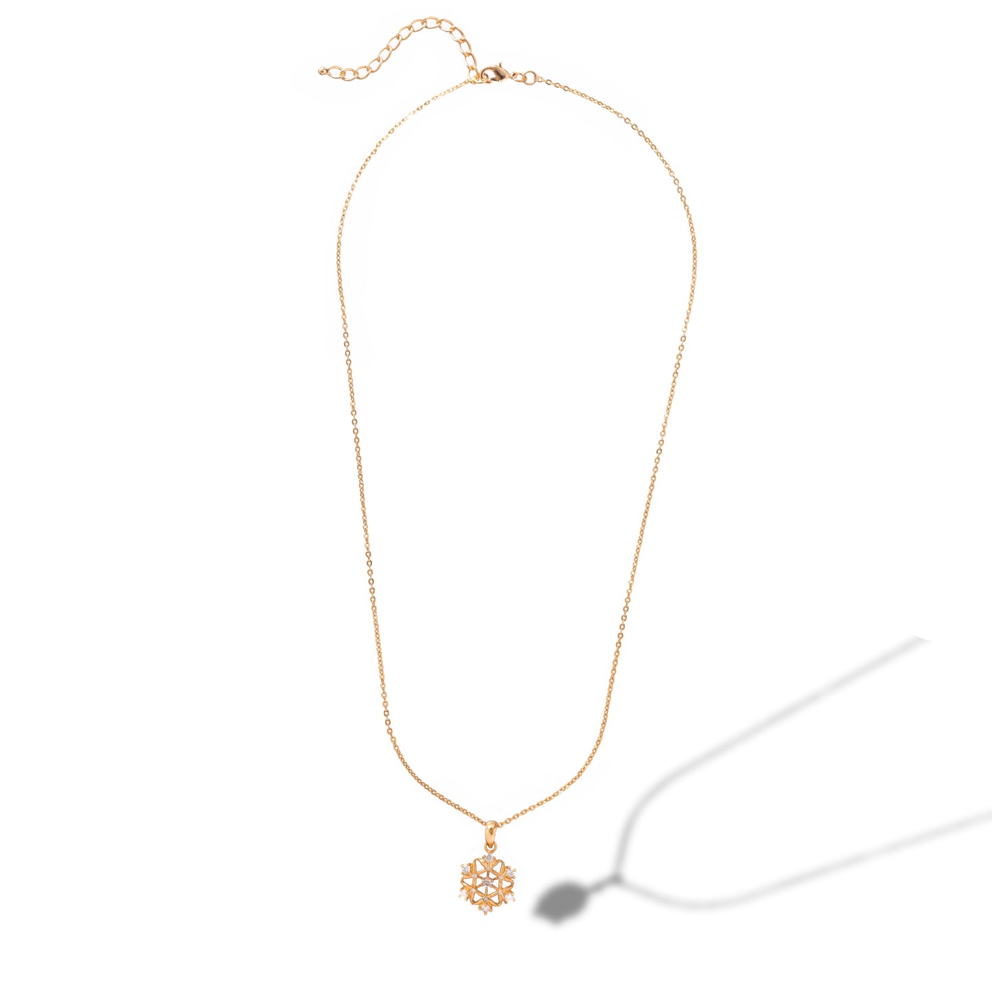 golden necklace with a diamond pendant