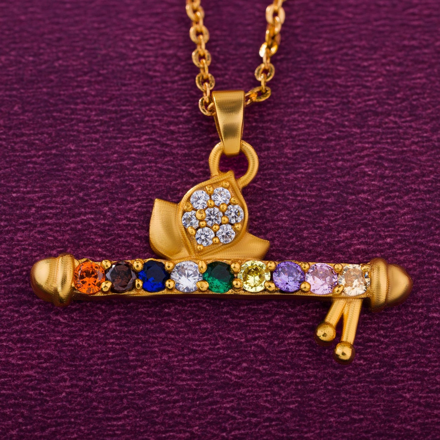 golden necklace with a flute pendants