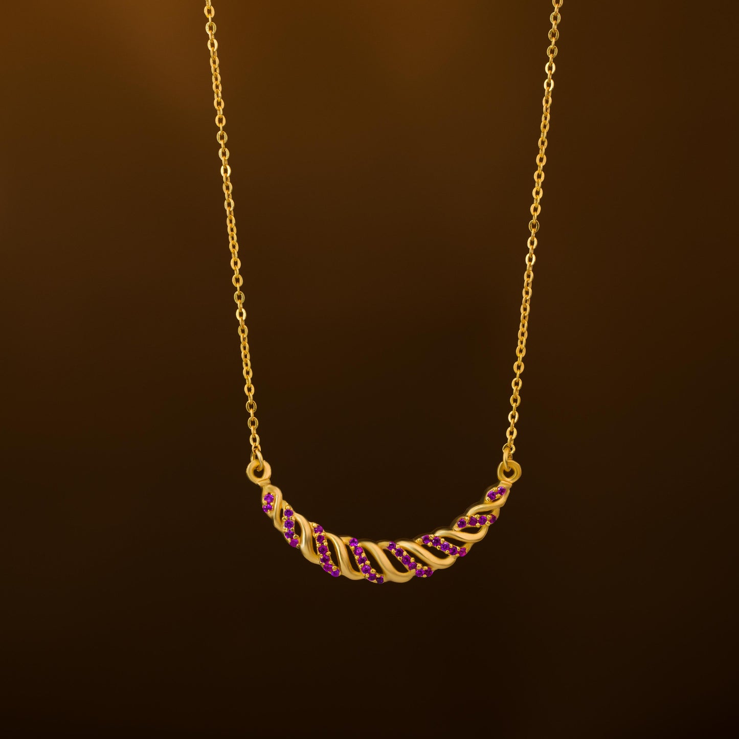 golden necklace with sapphire stones