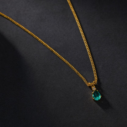 Golden Necklace with a Emerald Stone