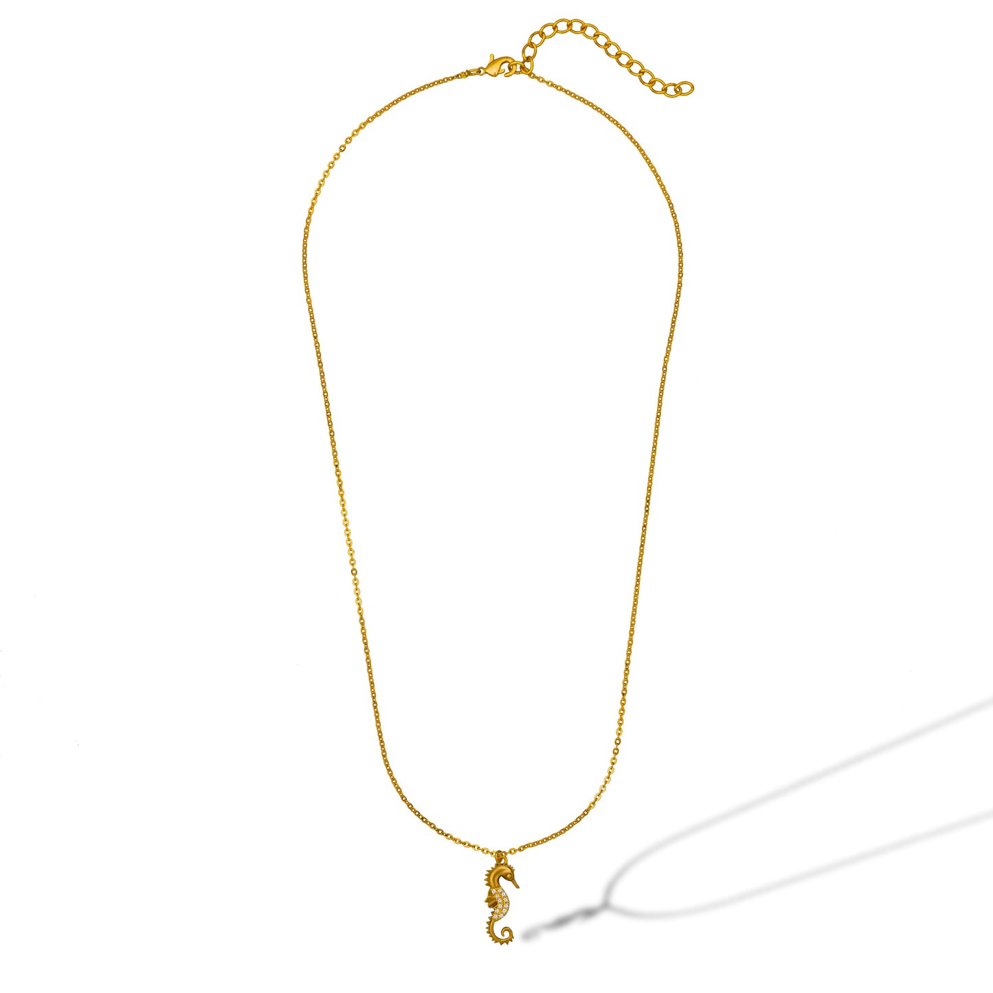 golden necklace with a seahorse