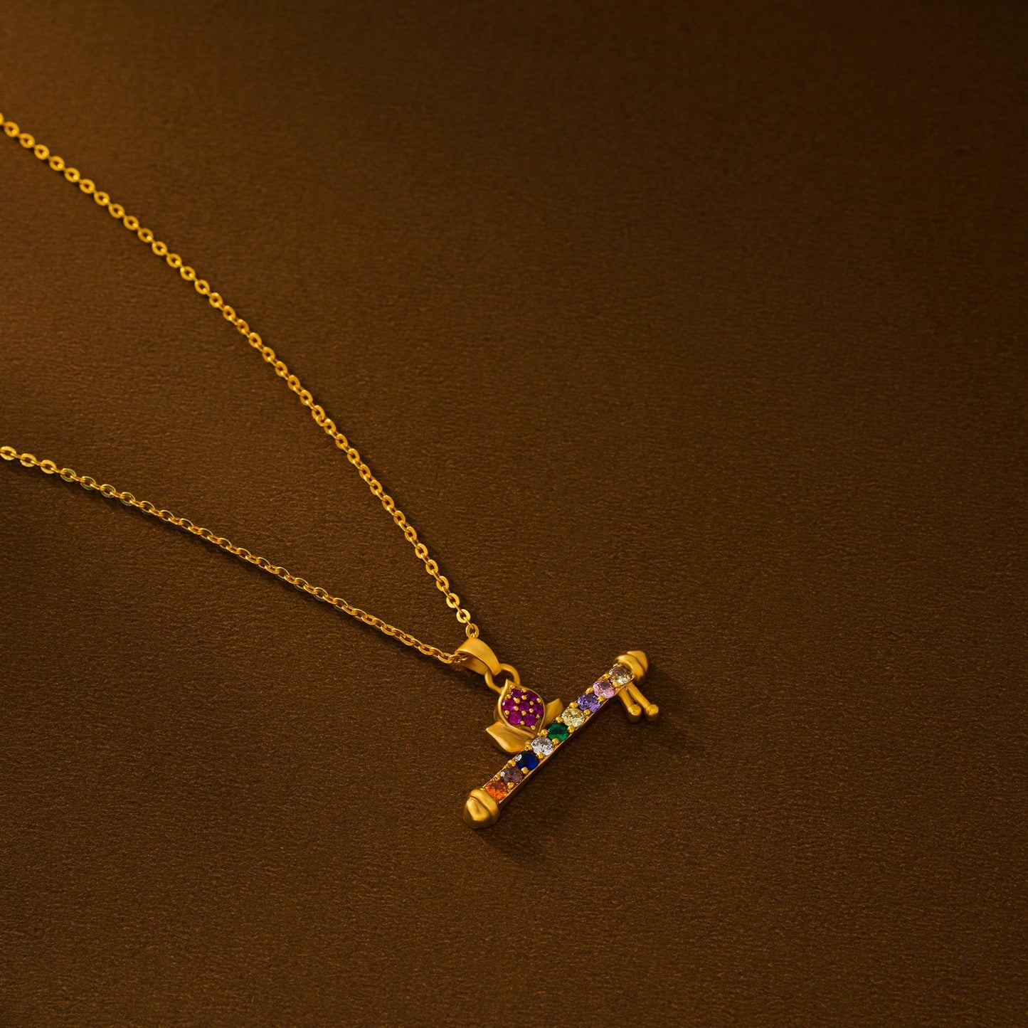 golden necklace with a flute pendants