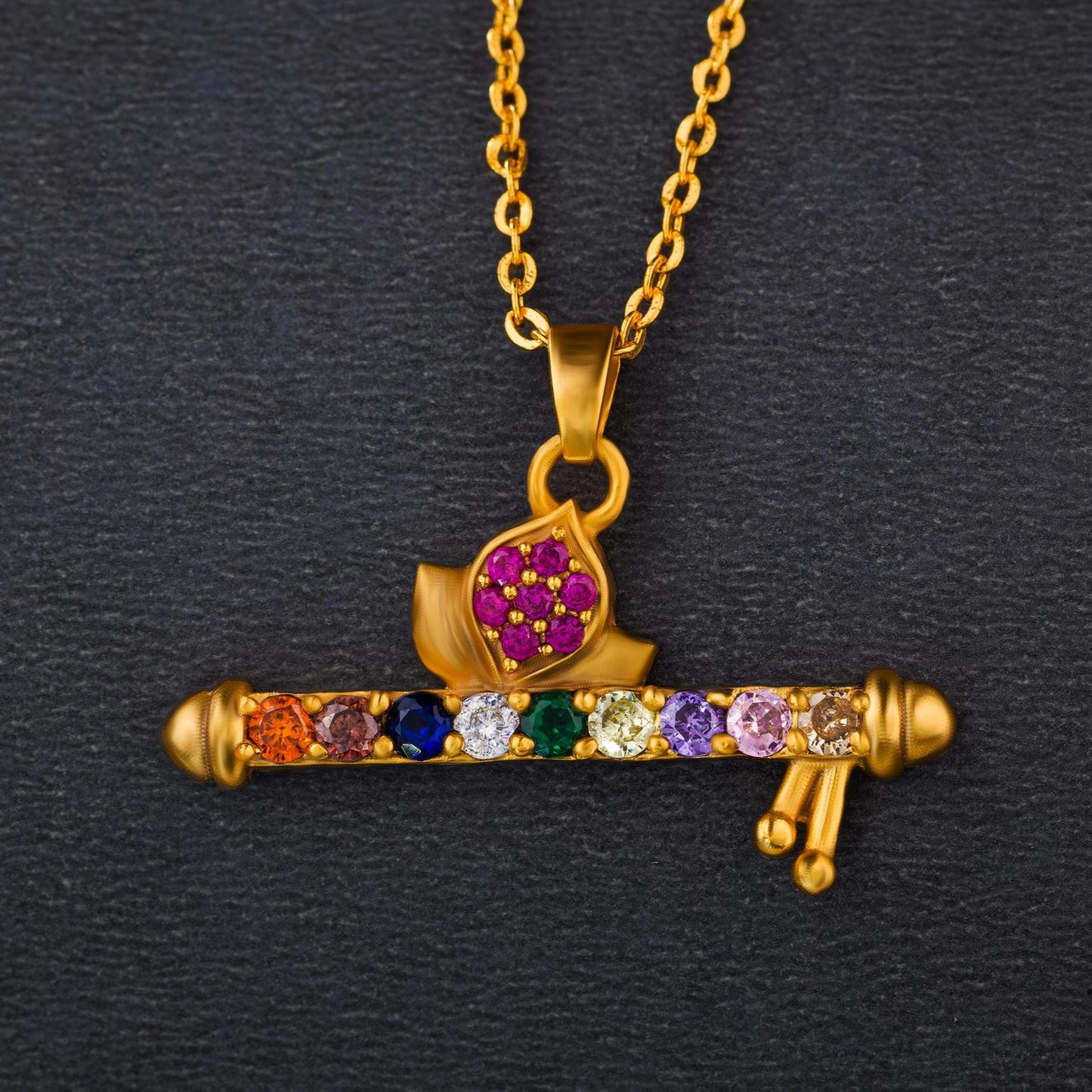 golden necklace with a flute pendants