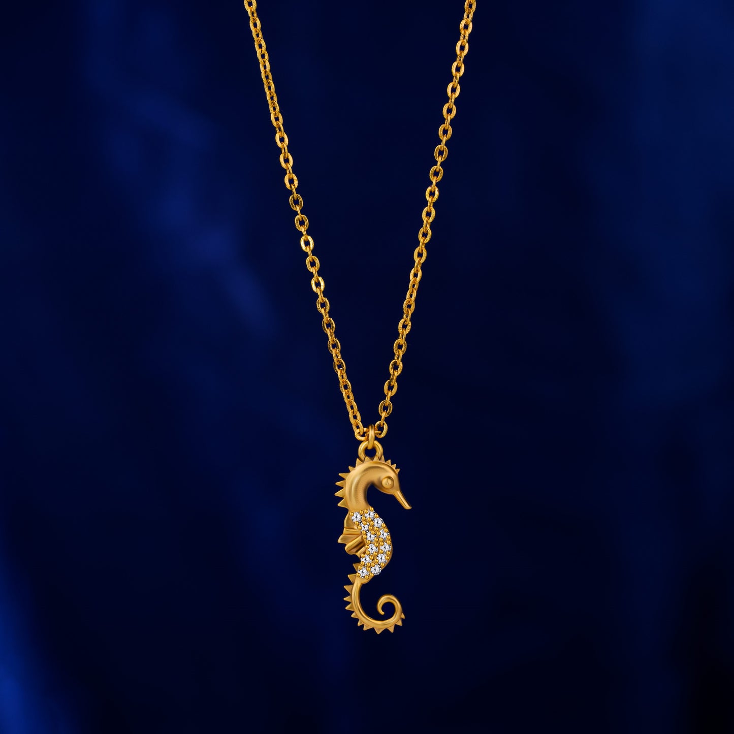 golden necklace with a seahorse