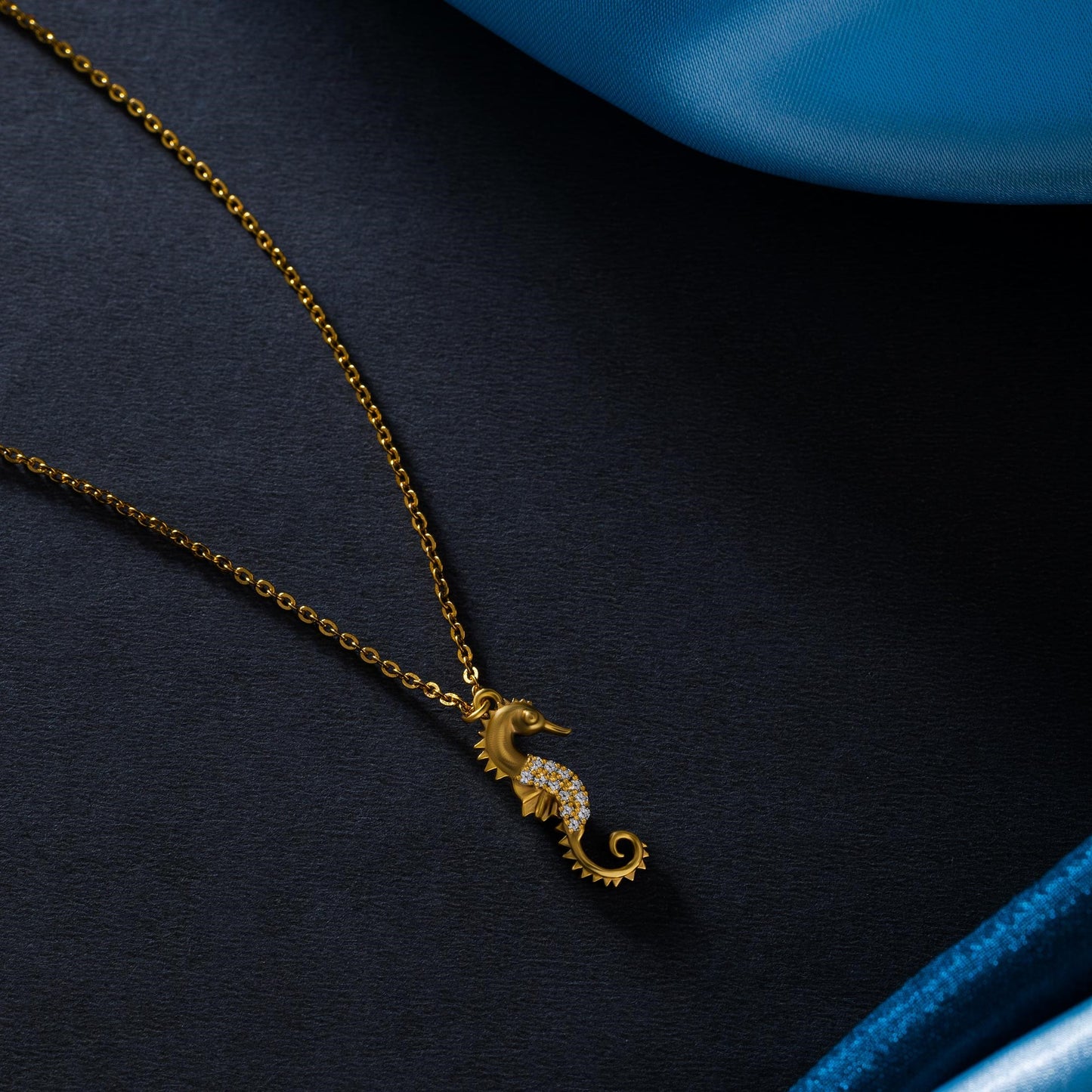 golden necklace with a seahorse