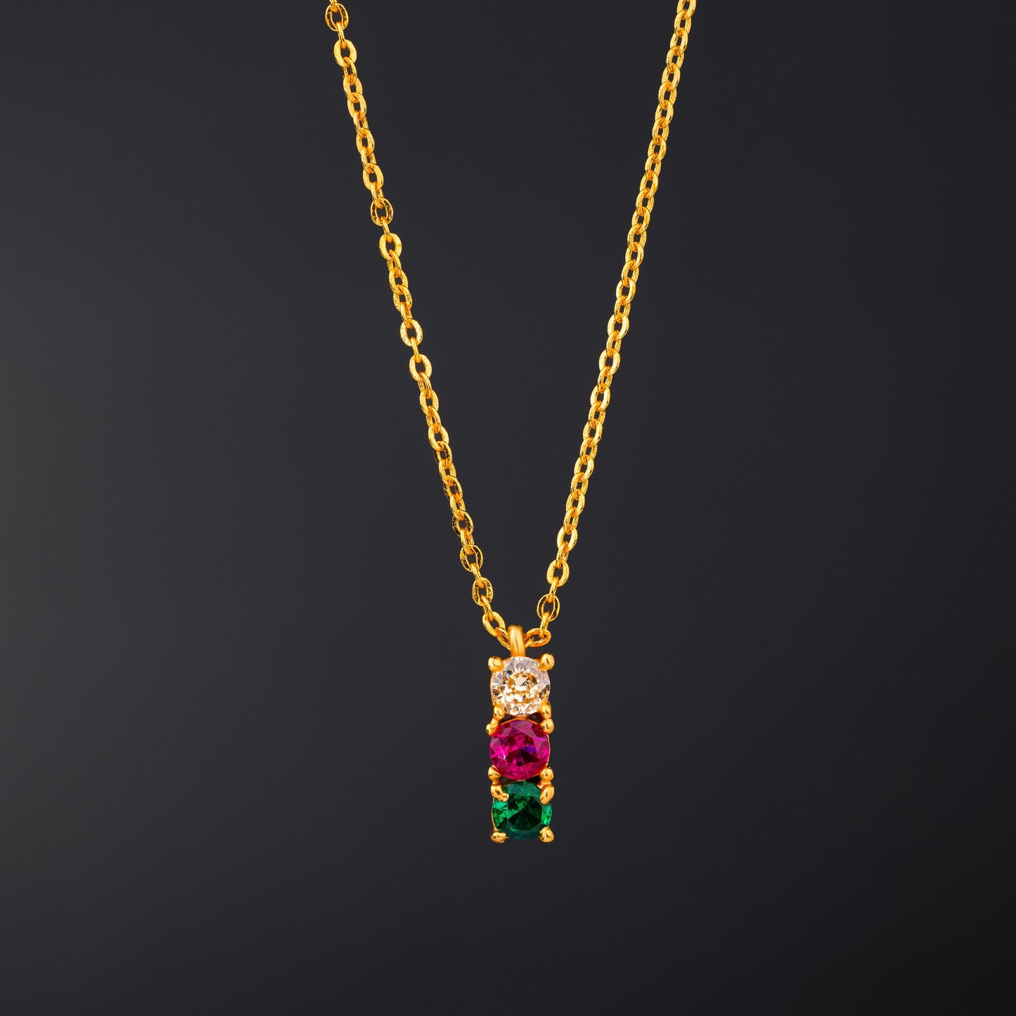 golden necklace with multicolur stones