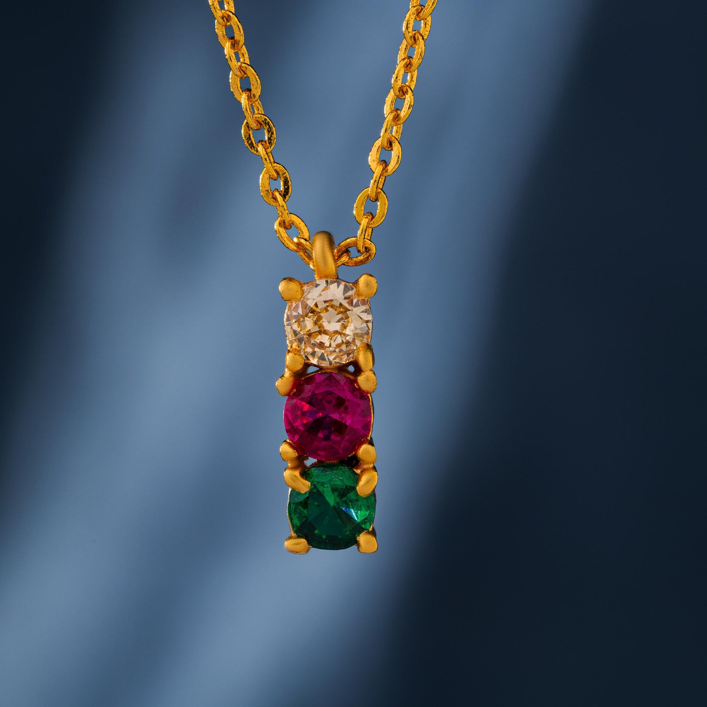 golden necklace with multicolur stones