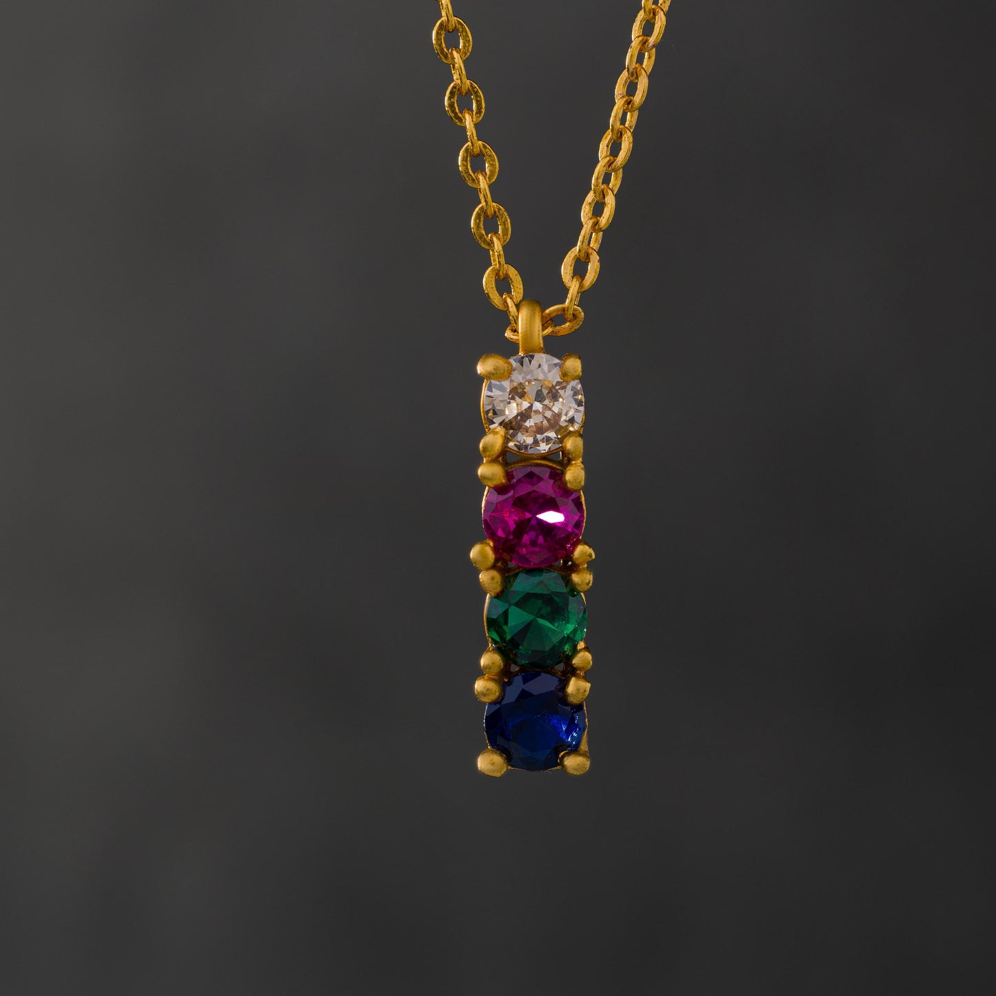 golden necklace with multicolor stones