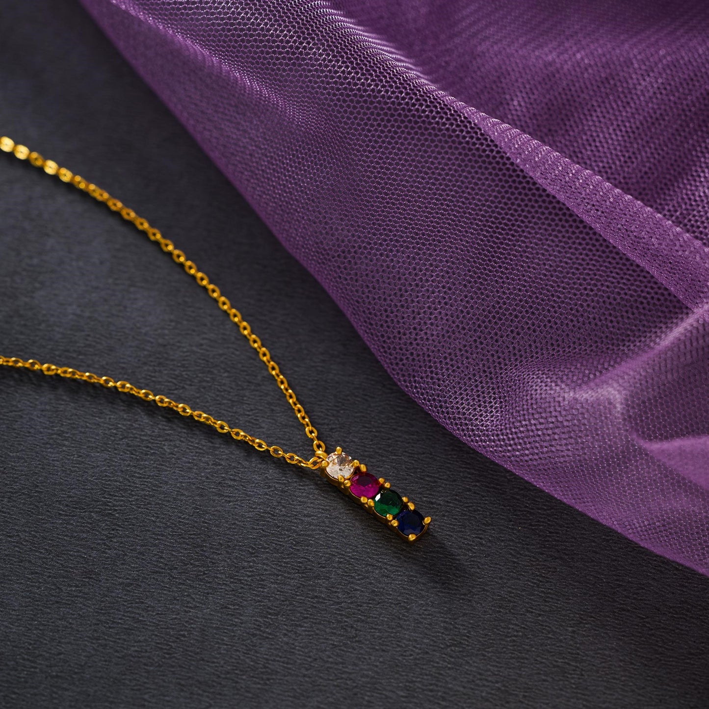 golden necklace with multicolor stones