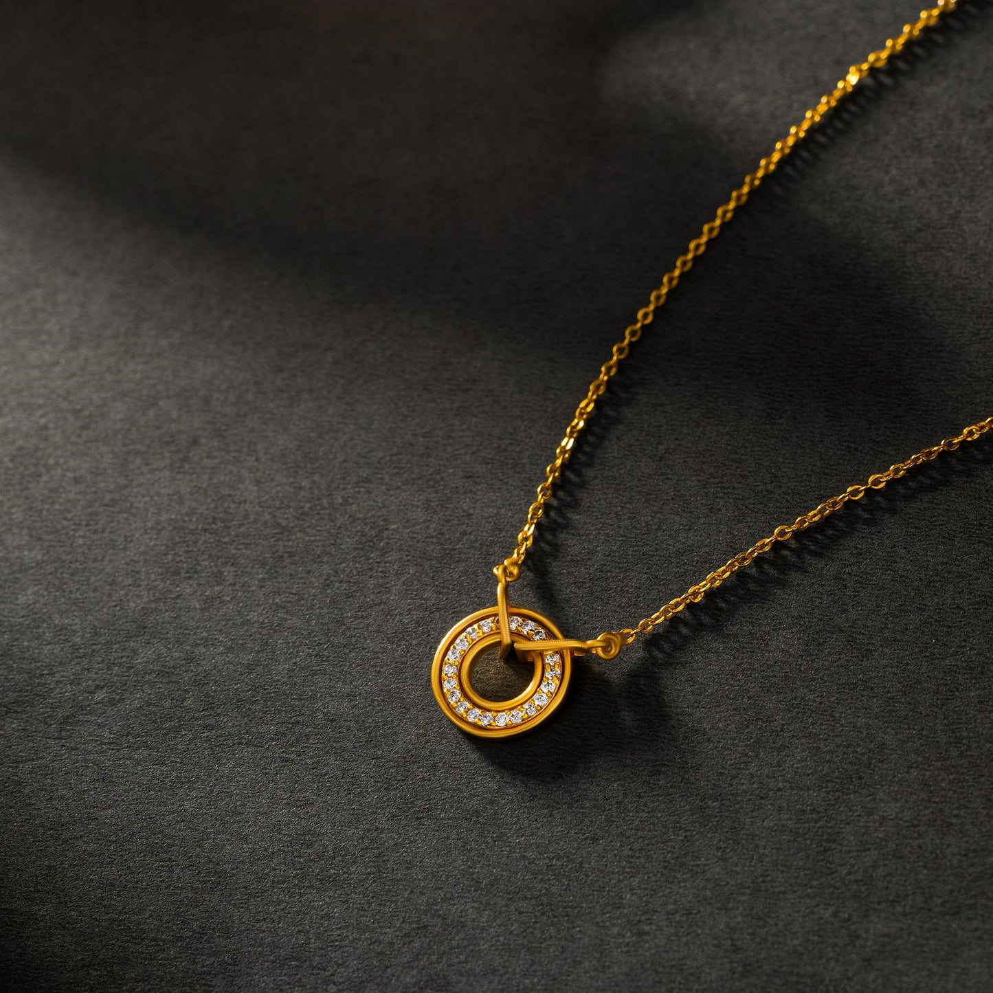 golden necklace with a diamond circle