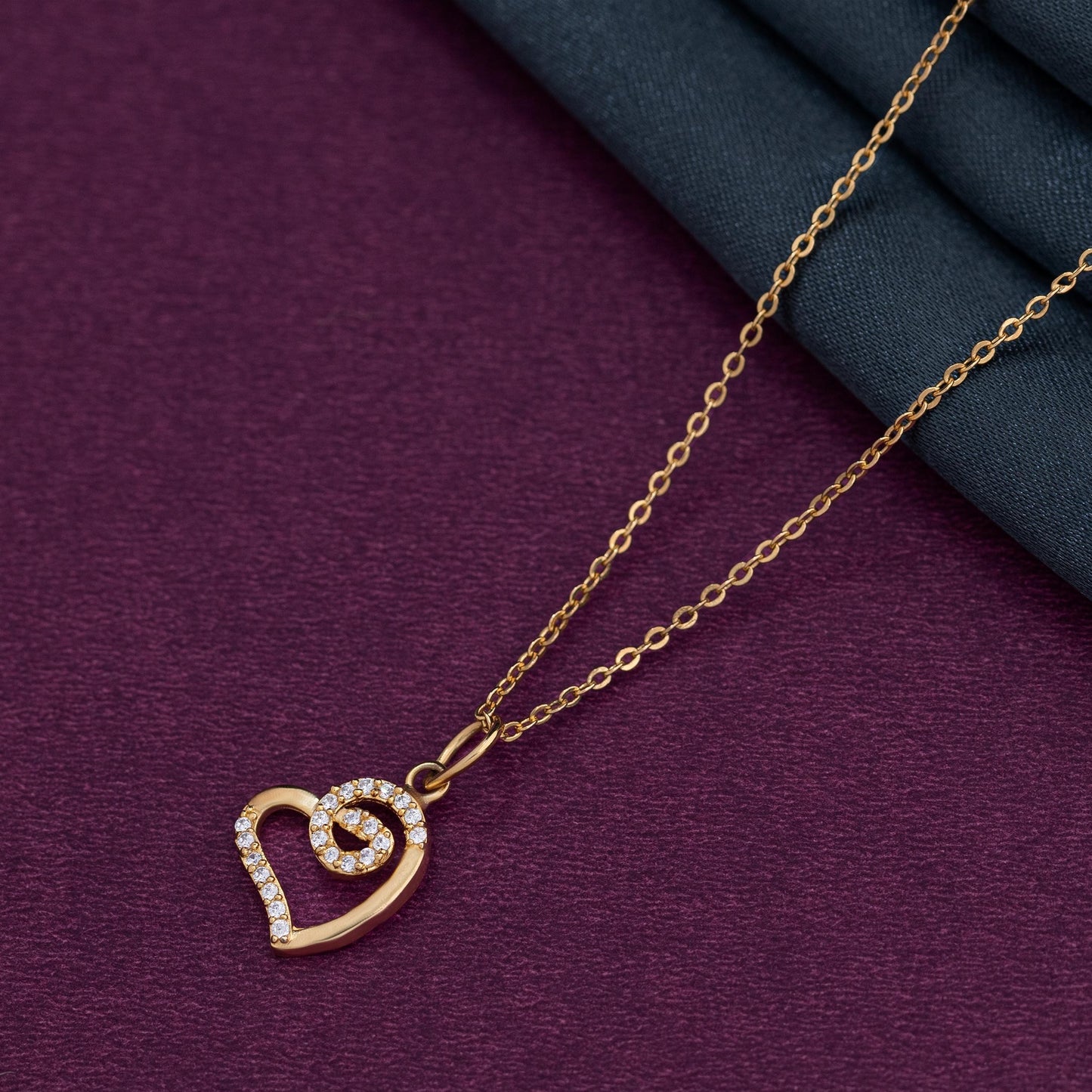 golden heart pendant with diamonds