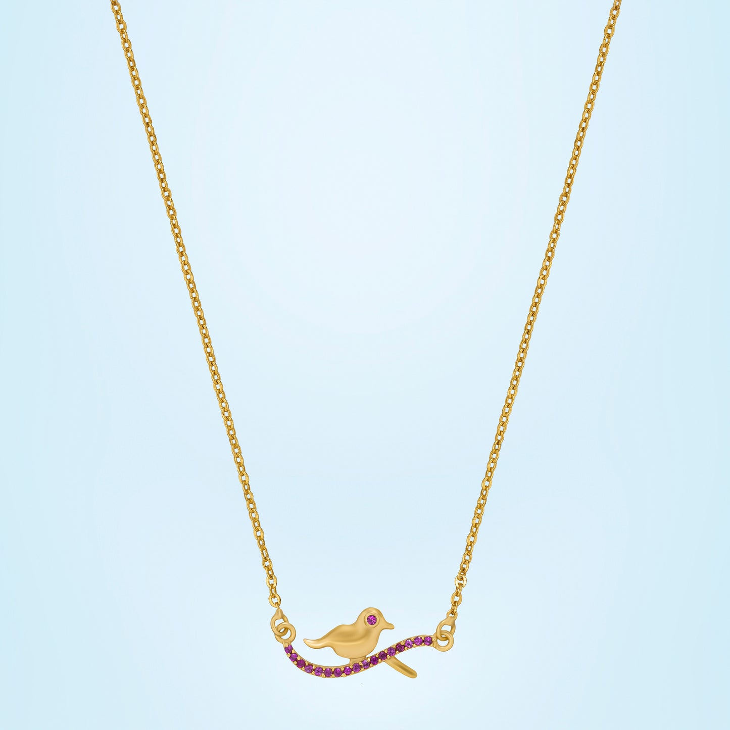 golden bird necklace with pink stones