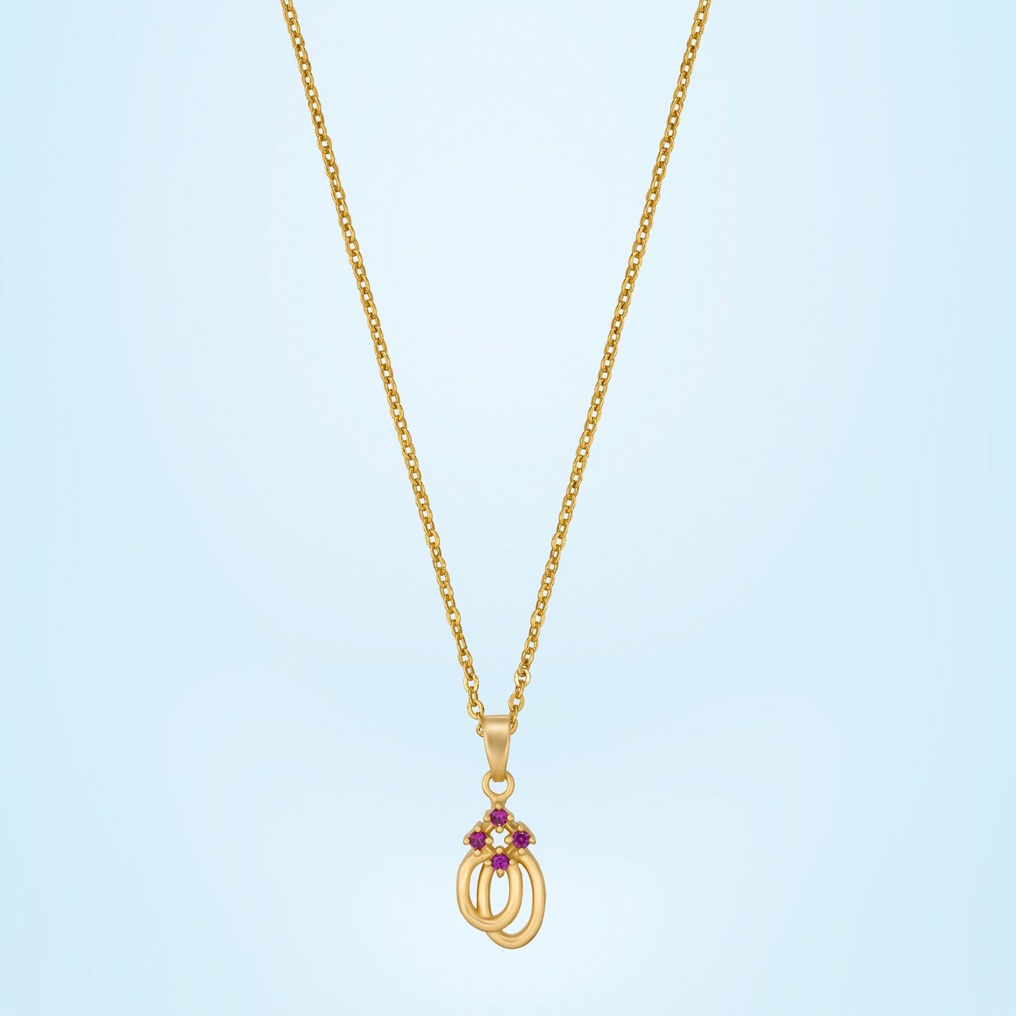 golden necklace with a diamond pendant