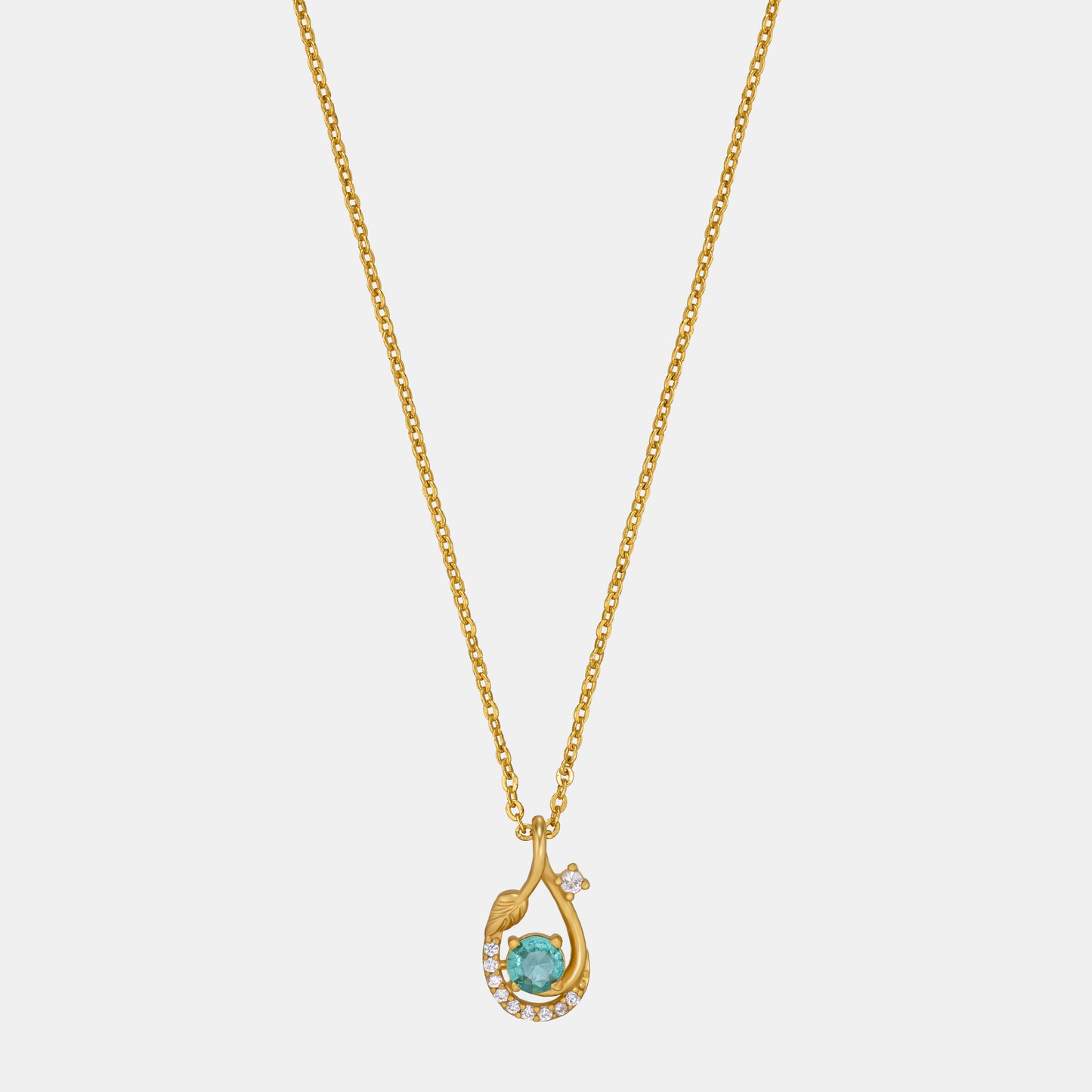 golden necklace with a stone and diamonds