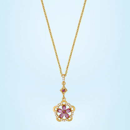 Golden Necklace Adorned with a Striking Red Flower Pendant