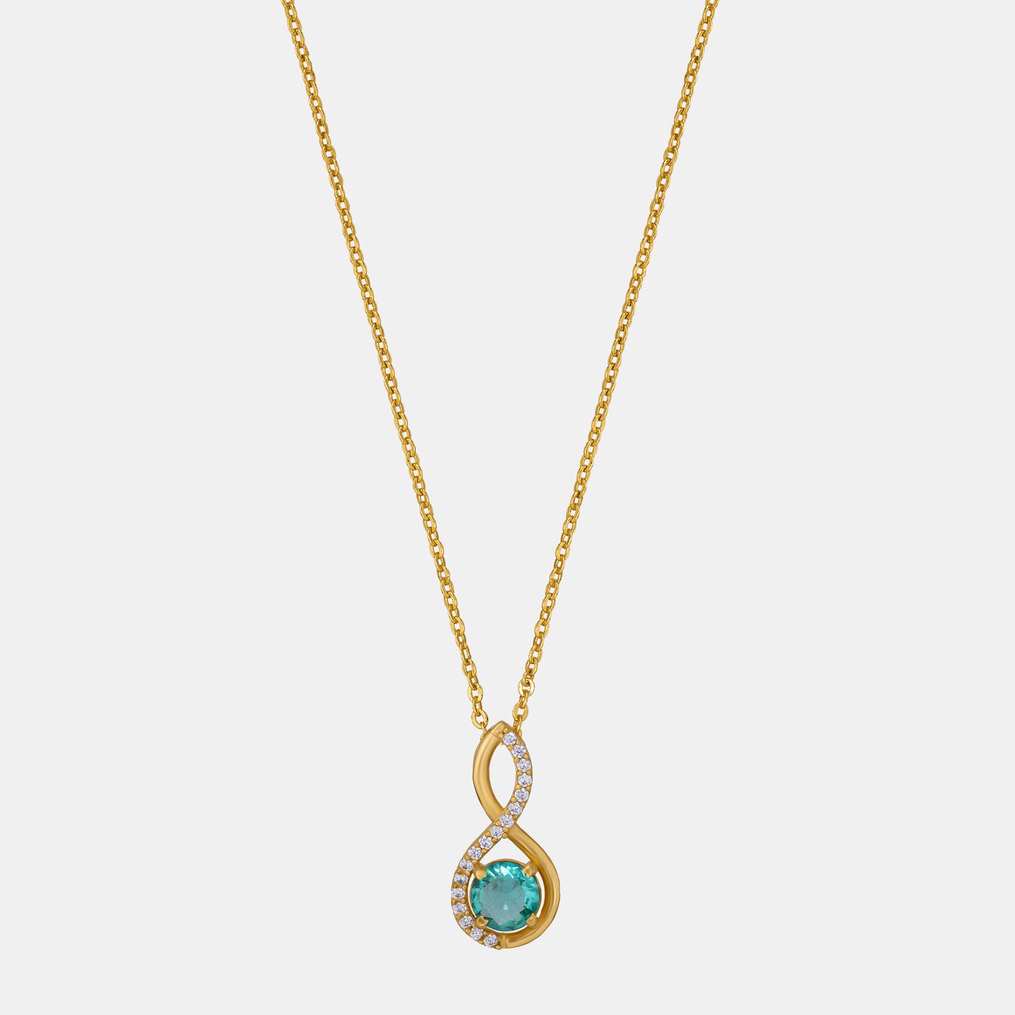 golden necklace with a stone and diamonds