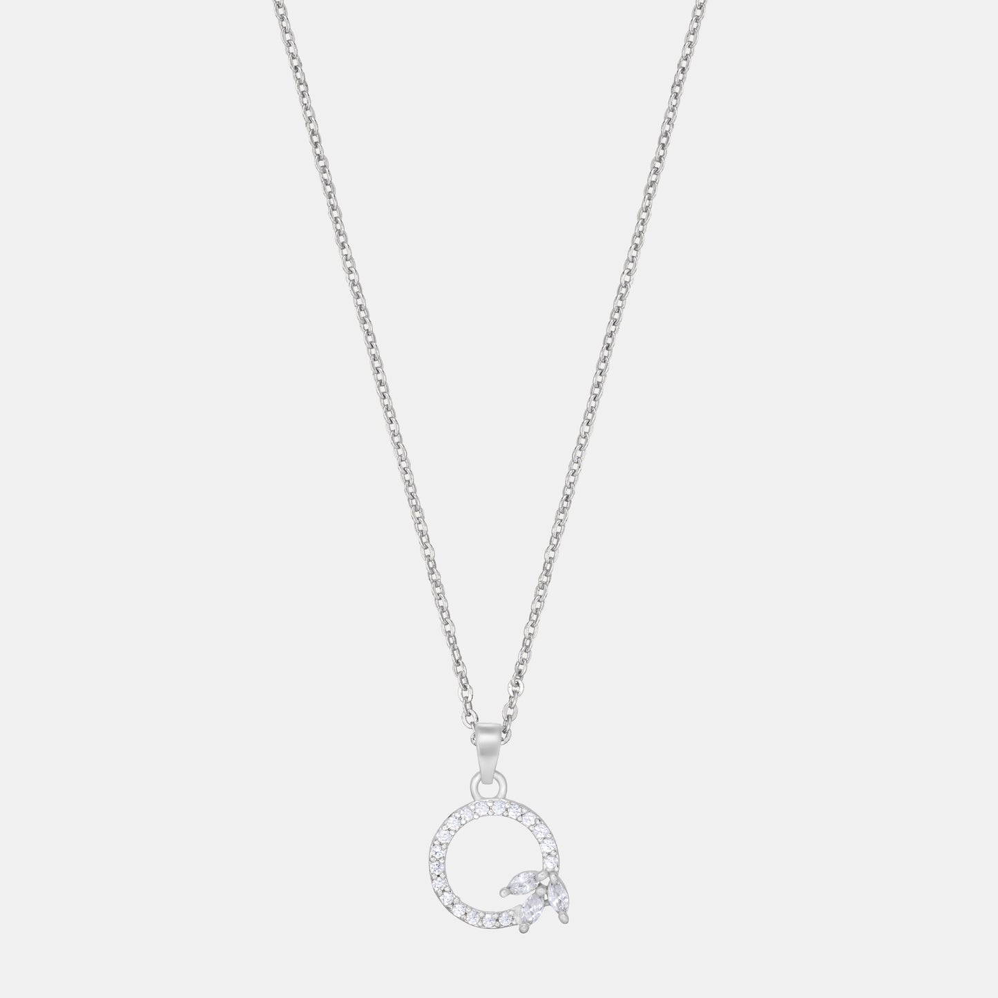 silver necklace with a diamond letter on it