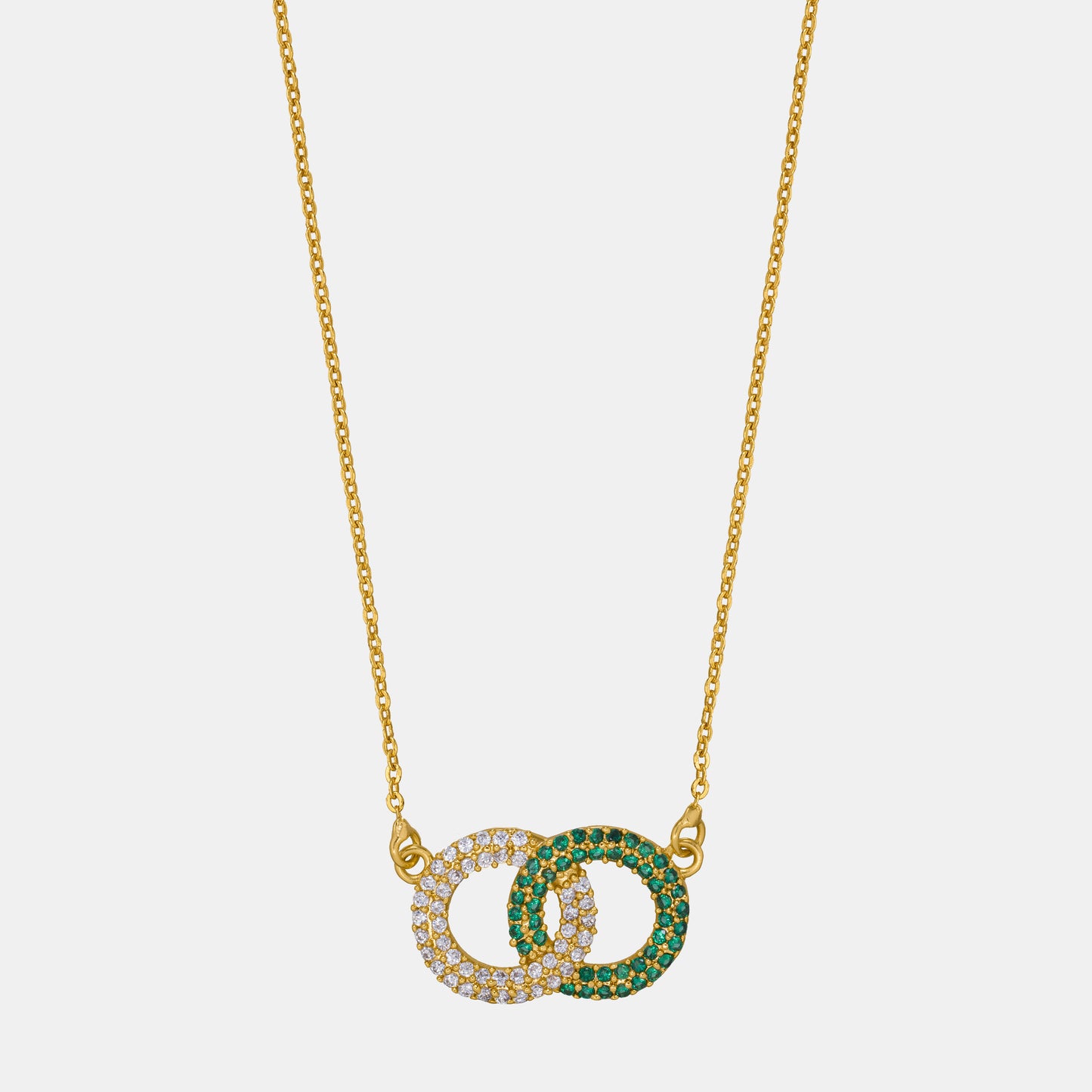 golden necklace with a diamond pendant