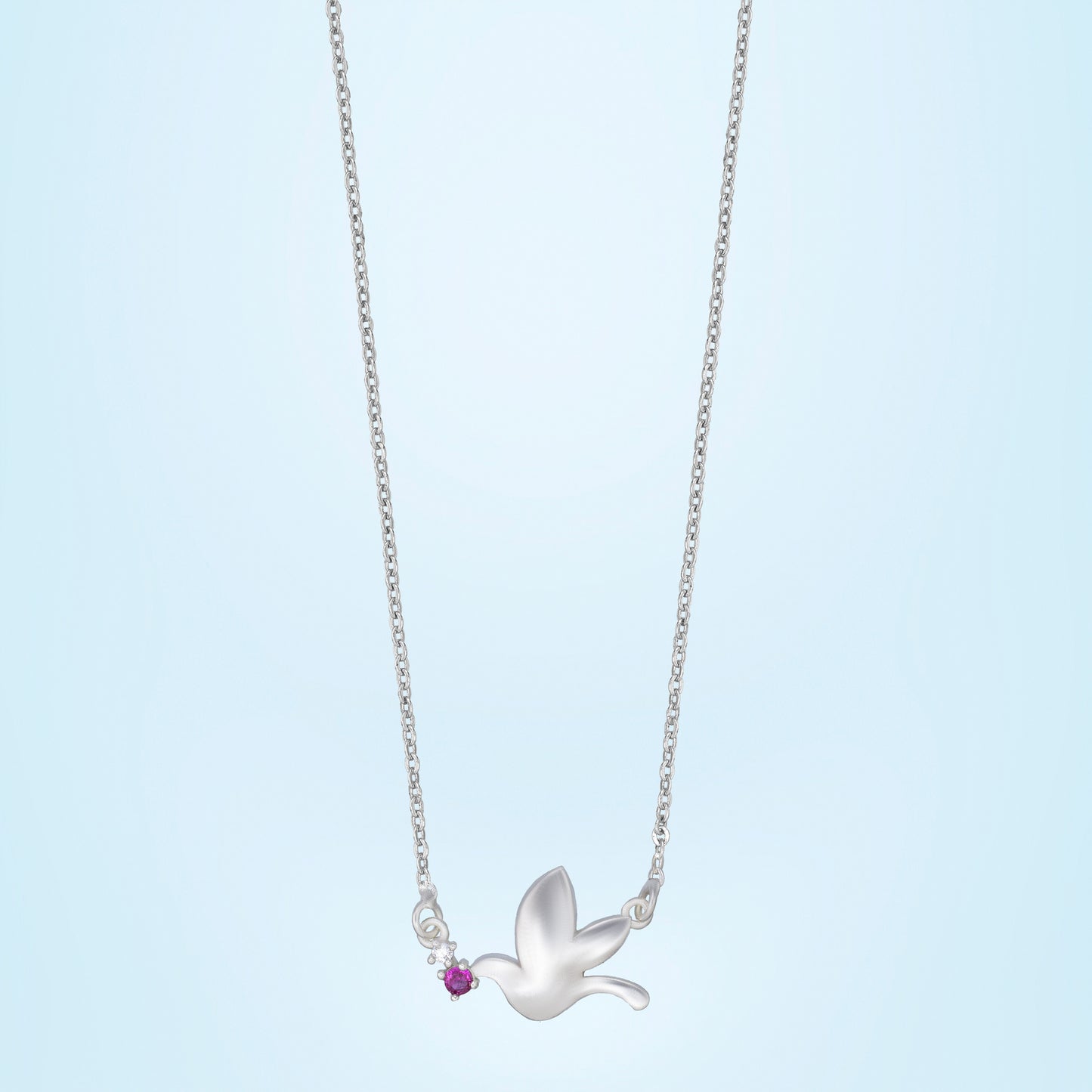 new heights with this enchanting silver bird necklace