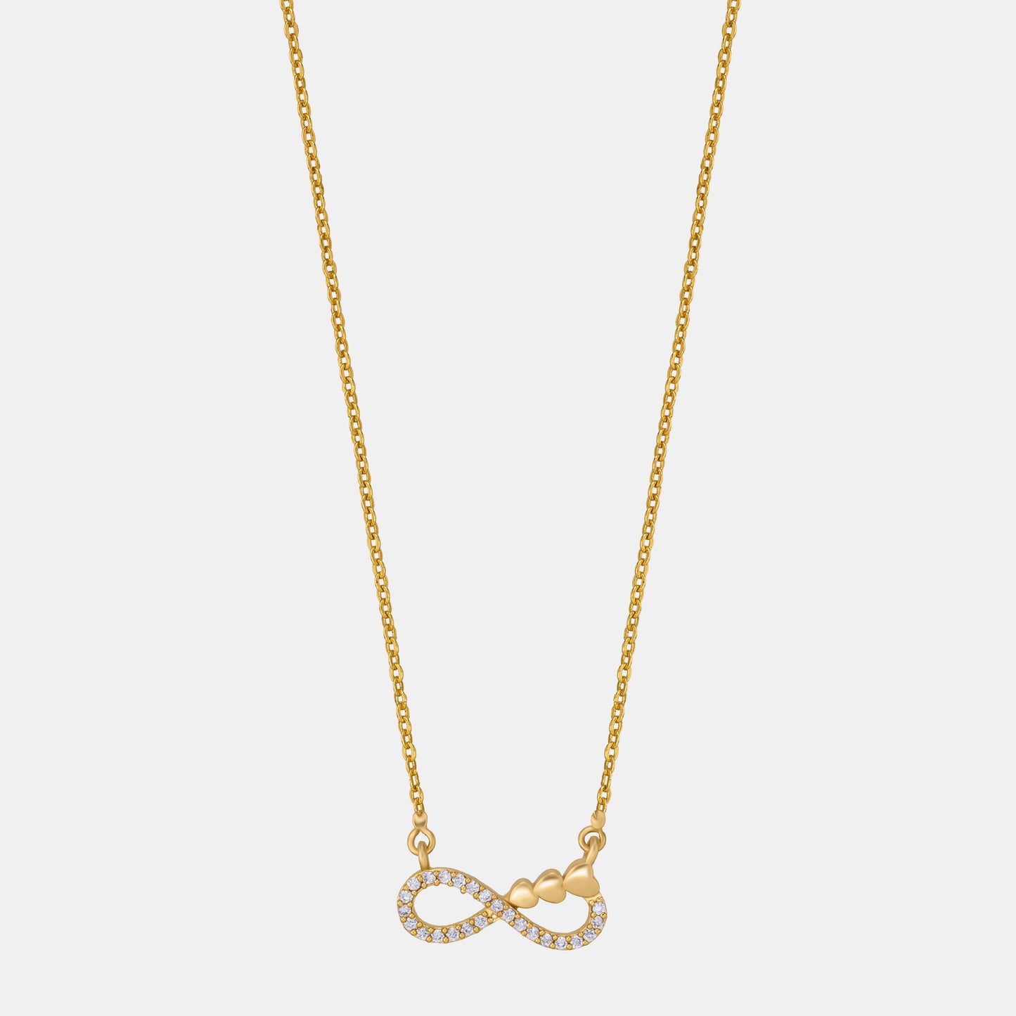 shine bright with this stunning golden necklace featuring a white infinity