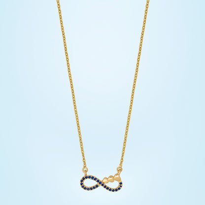 Shine Bright with this Stunning Golden Necklace Featuring a Blue Infinity