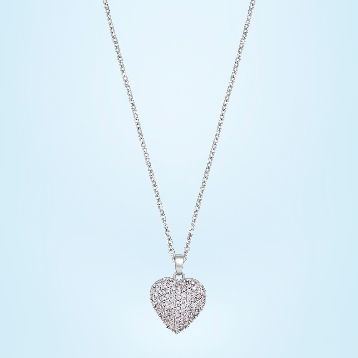 silver necklace with a heart pendant