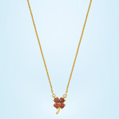 Golden Necklace Featuring a Four-Leaf Clover Pendant