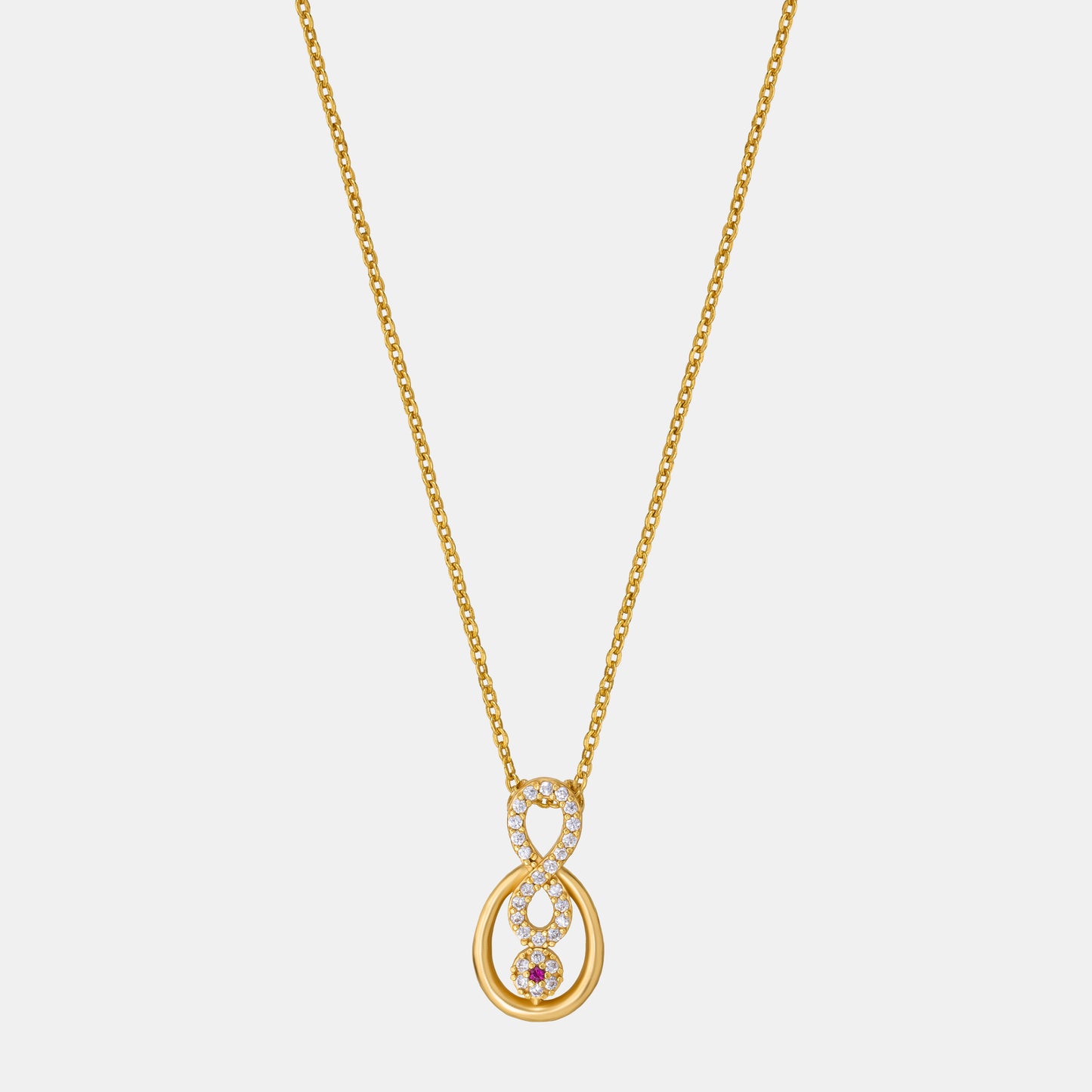 golden necklace with a diamond pendant