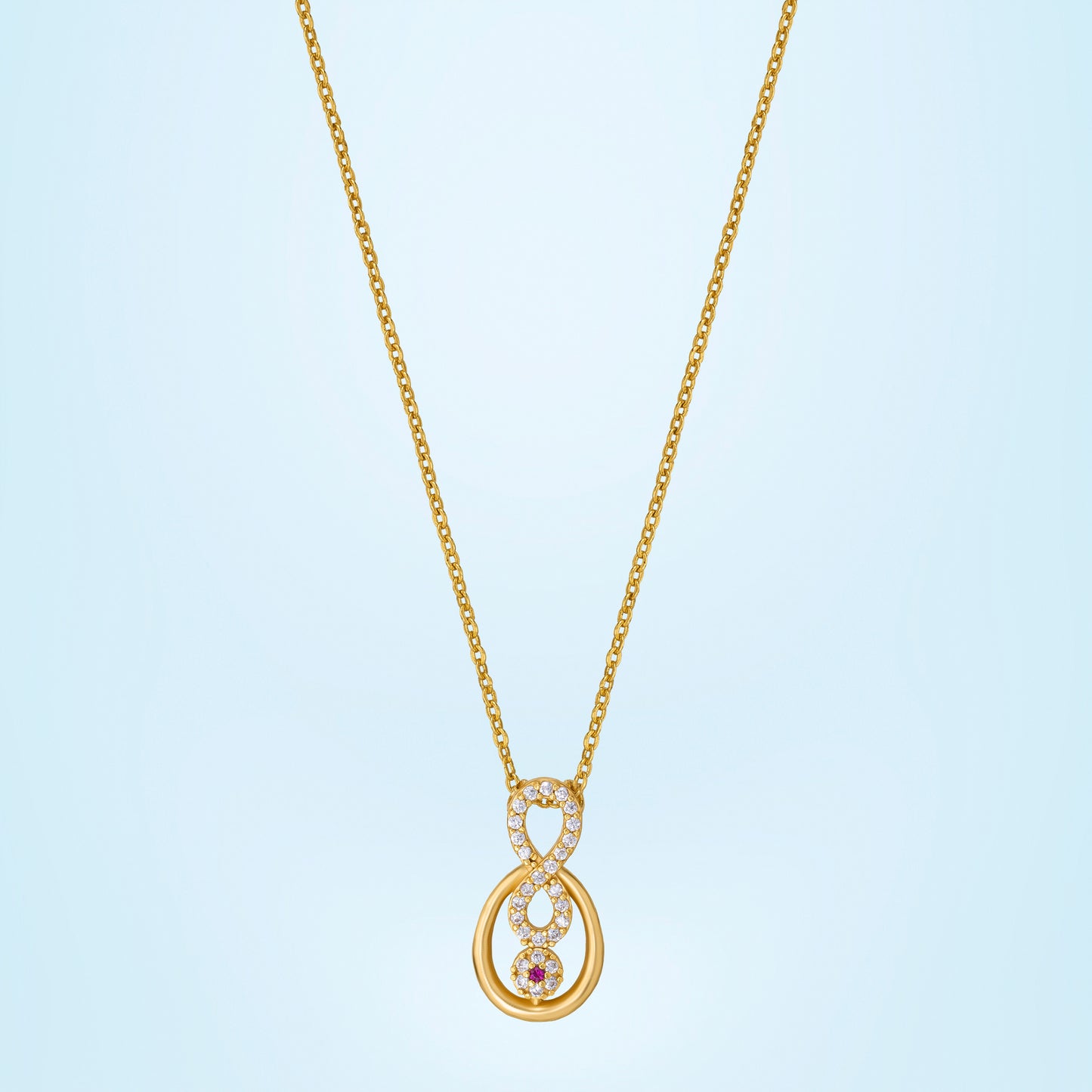 golden necklace with a diamond pendant