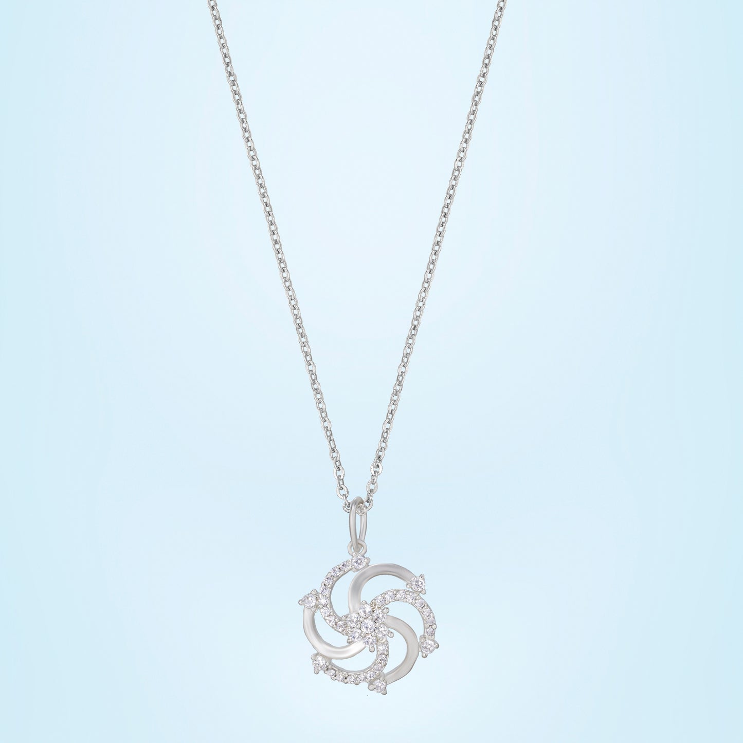 silver necklace with a diamond pendant