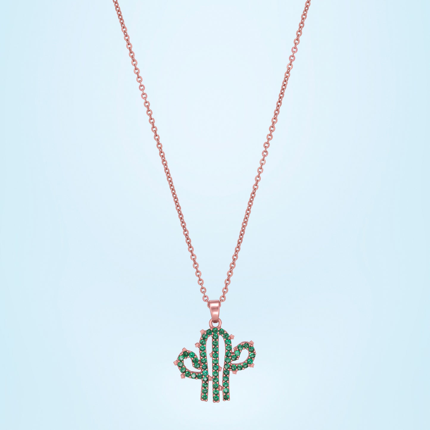 green and rose gold necklace with a cactus charm