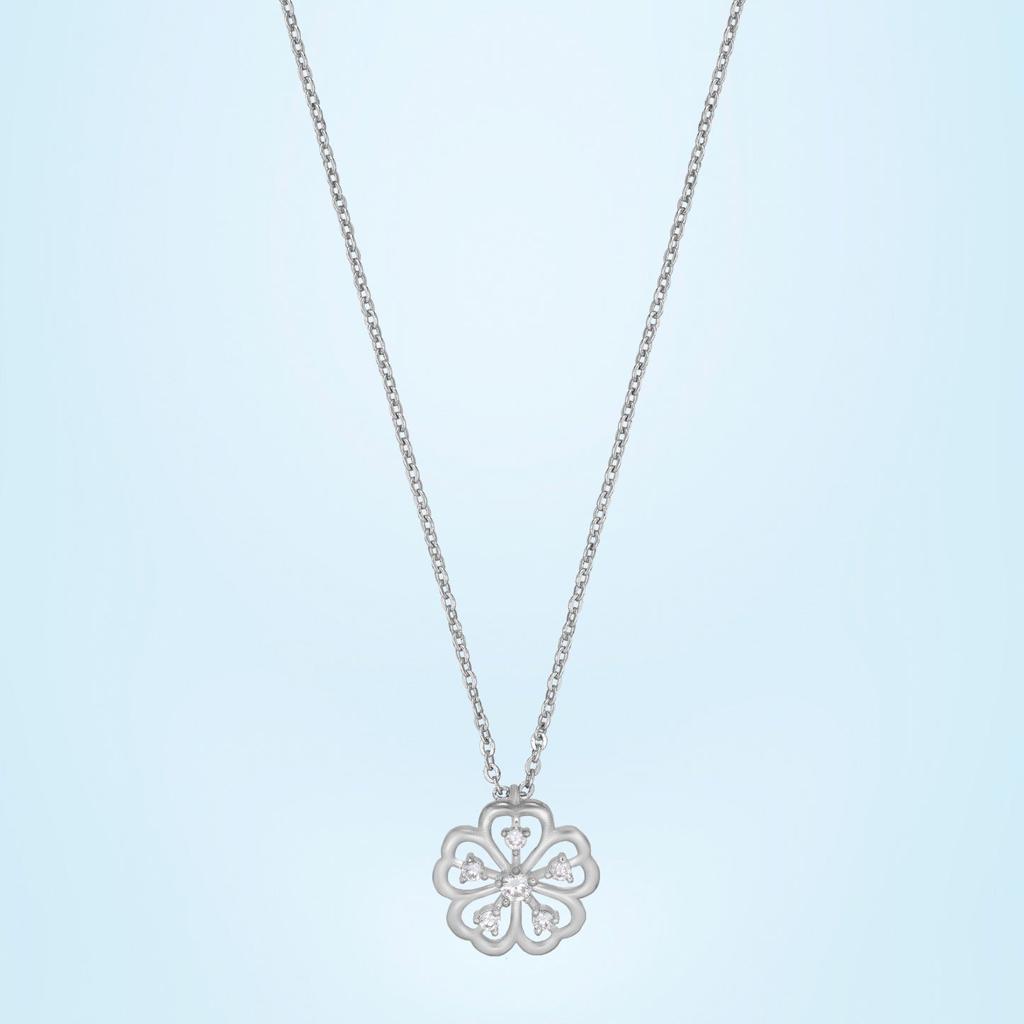 silver necklace with a clover design