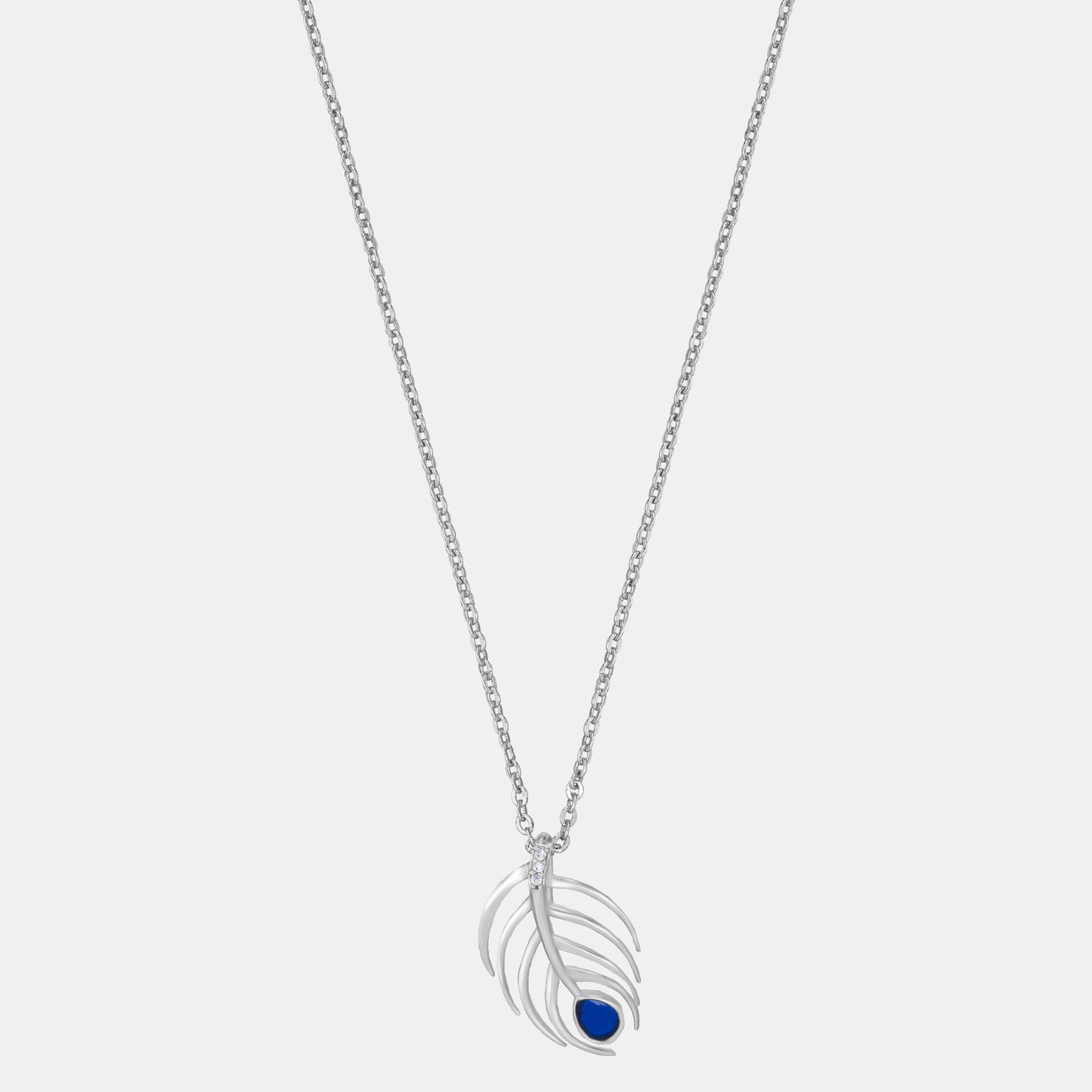 silver necklace with a blue stone