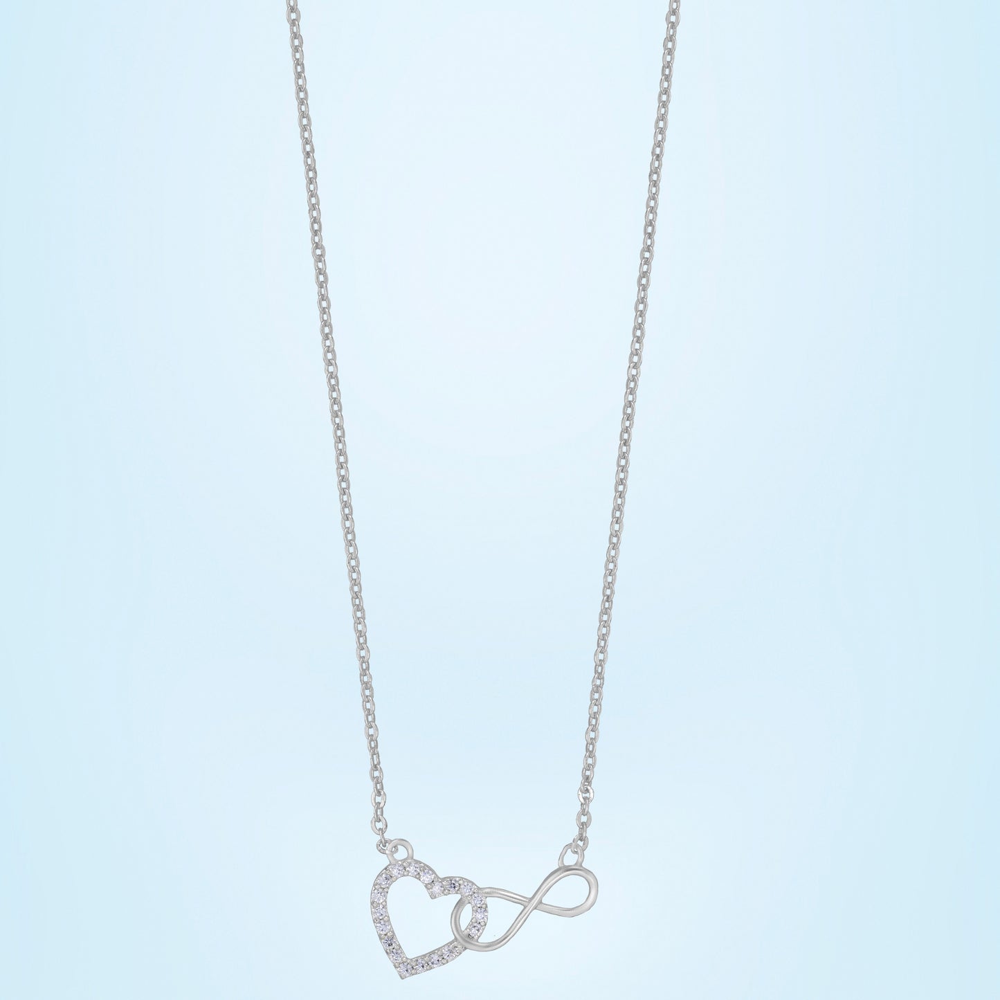 silver necklace with heart and infinity