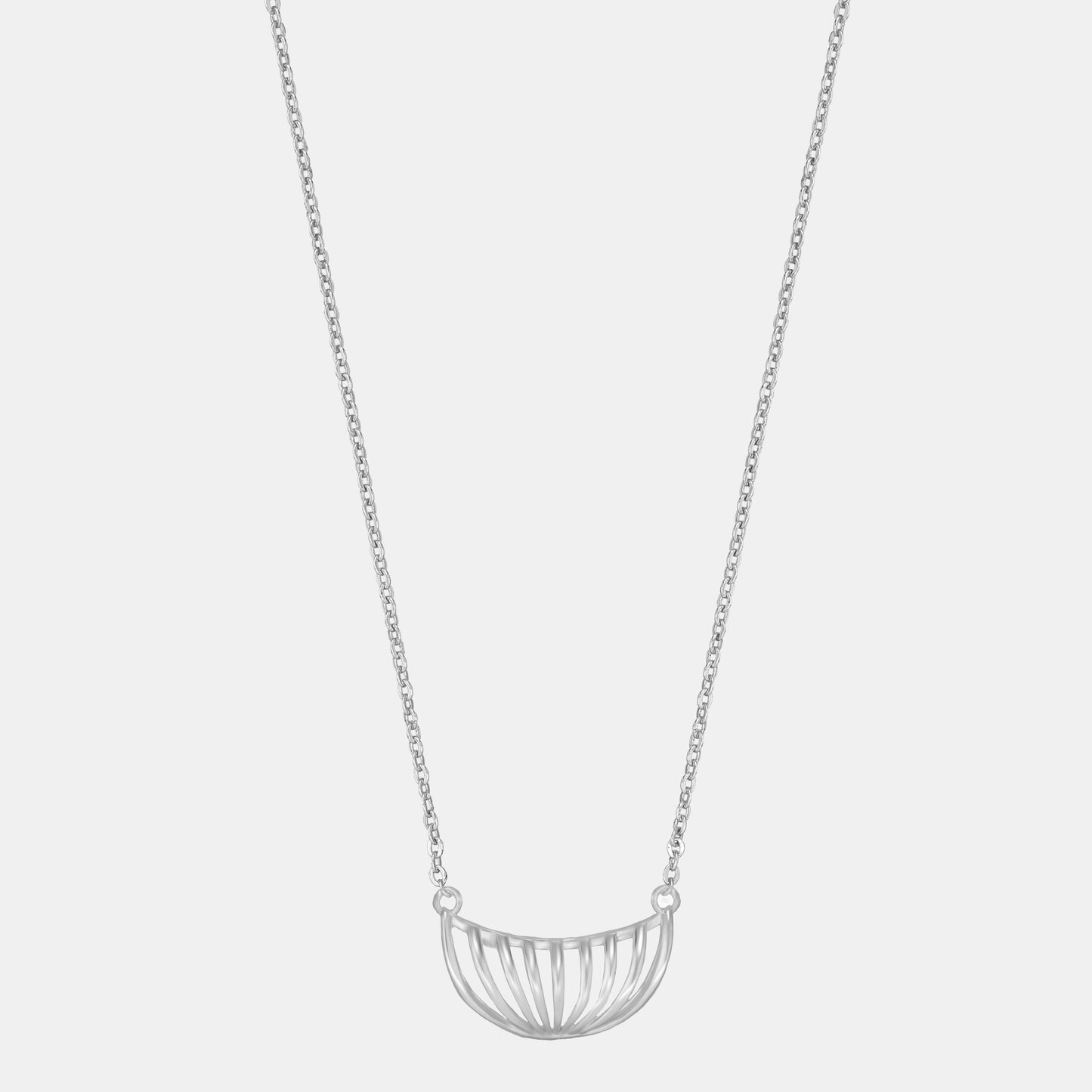 silver necklace with a large curved design