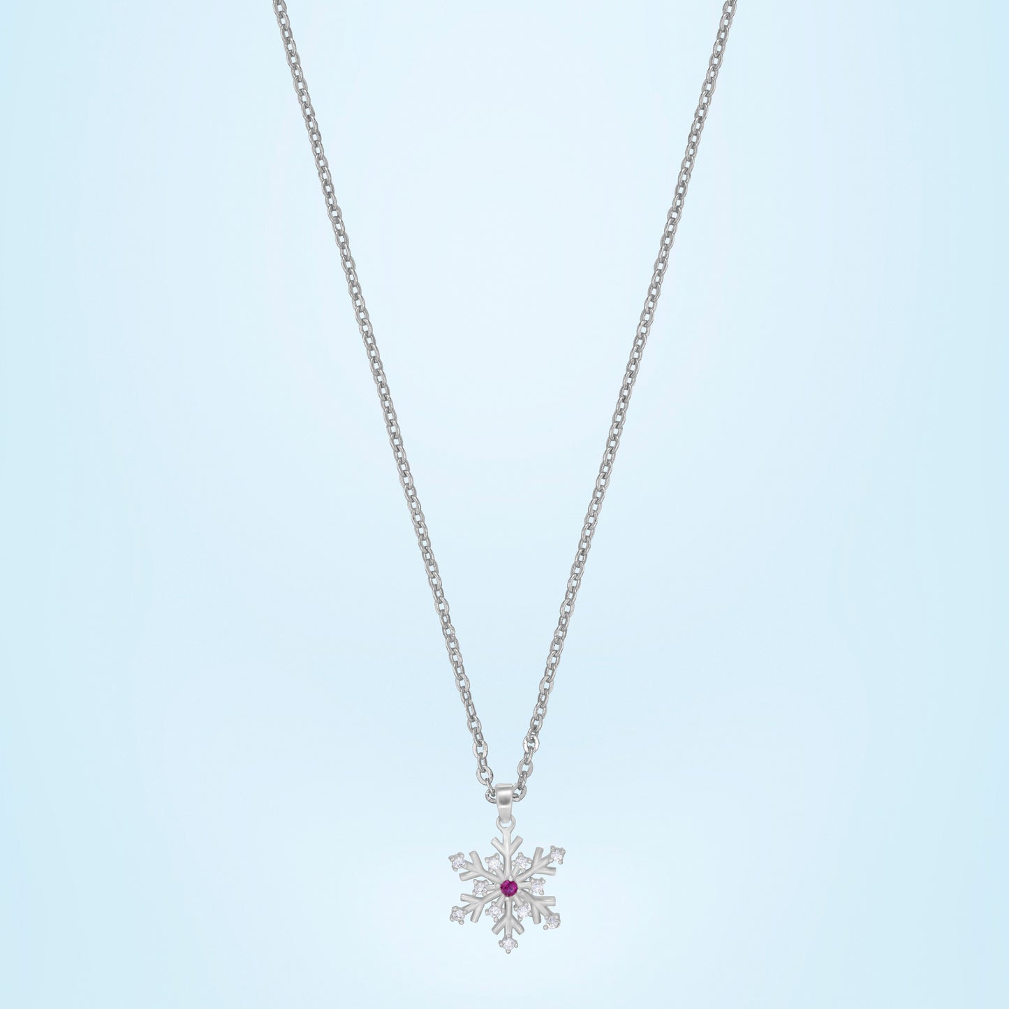 silver necklace with a flower charm